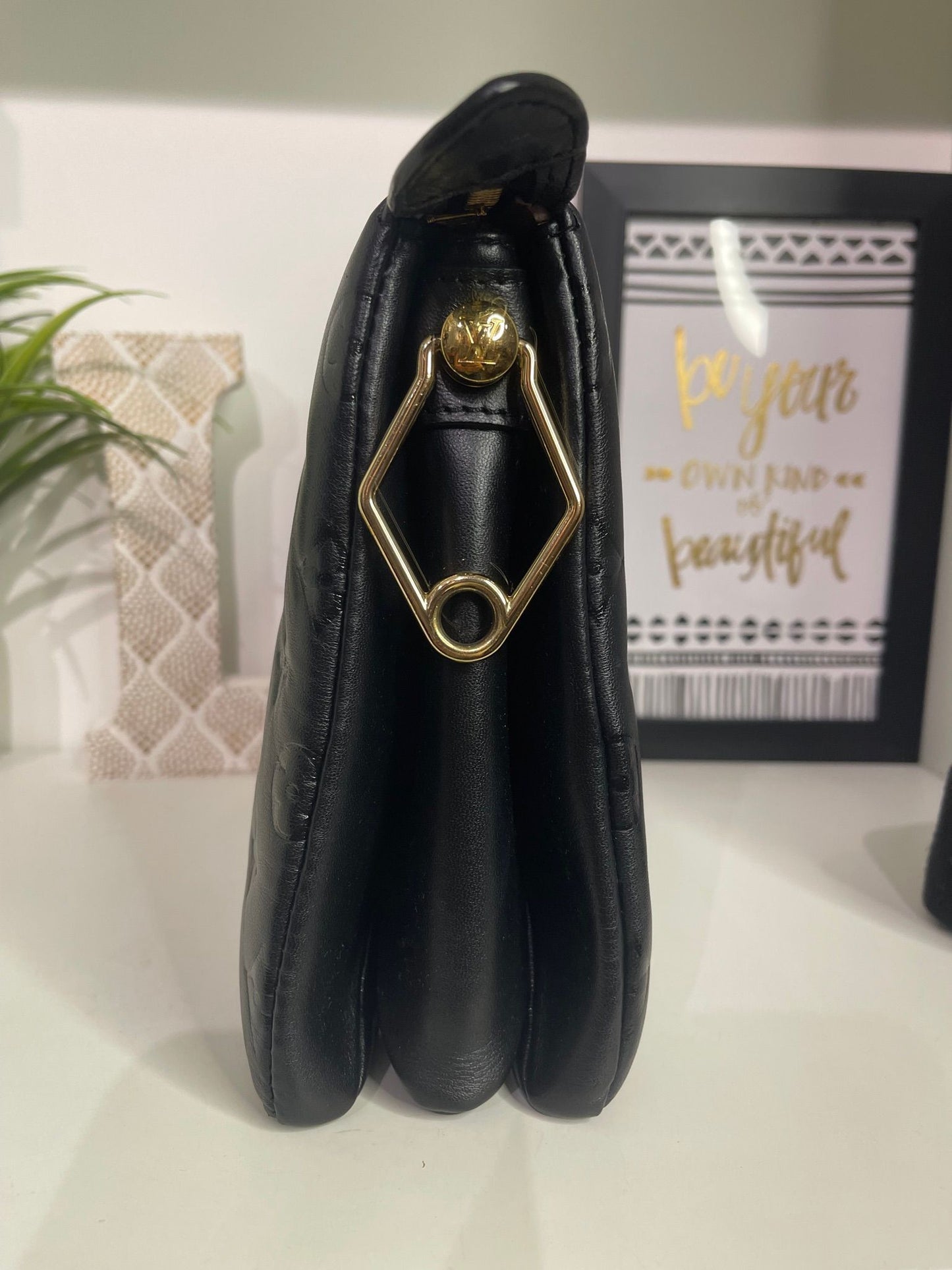 24. Louis Vuitton Black Coussin PM