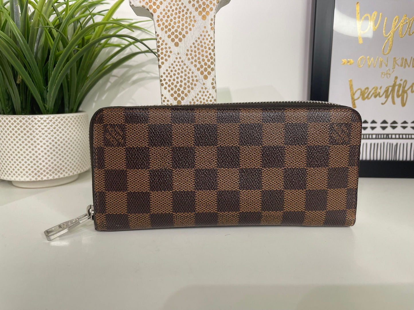 43. Louis Vuitton Damier Ebene Zippy Wallet
