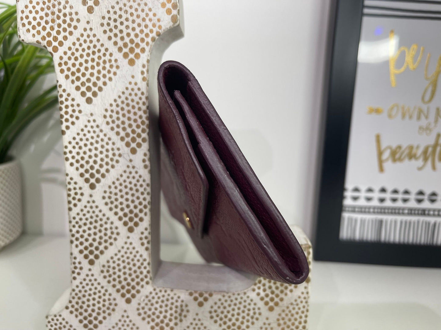 112. Louis Vuitton Aurore Monogram Empreinte Leather Curieuse Wallet