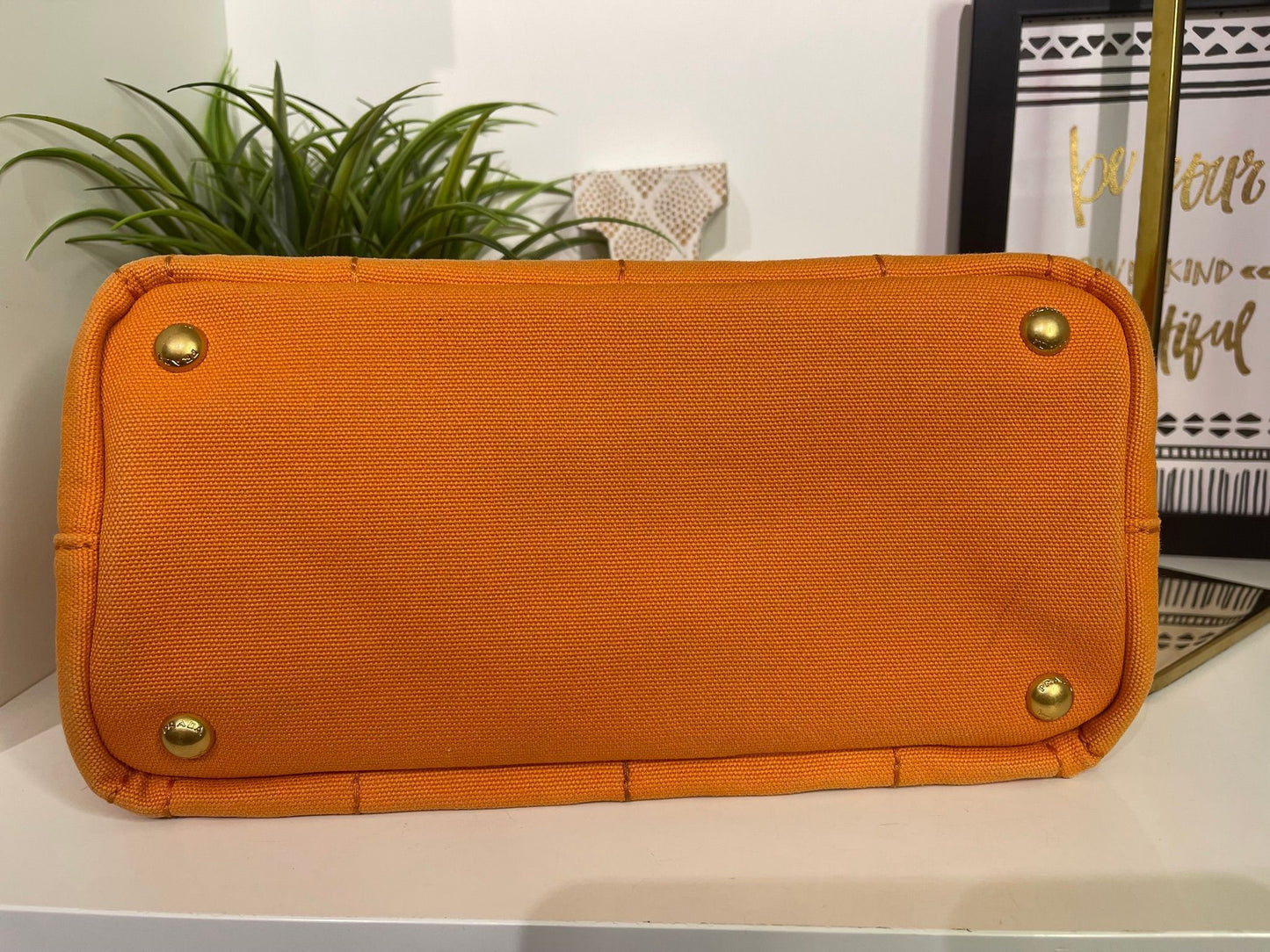 100. Prada Small Orange Canapa