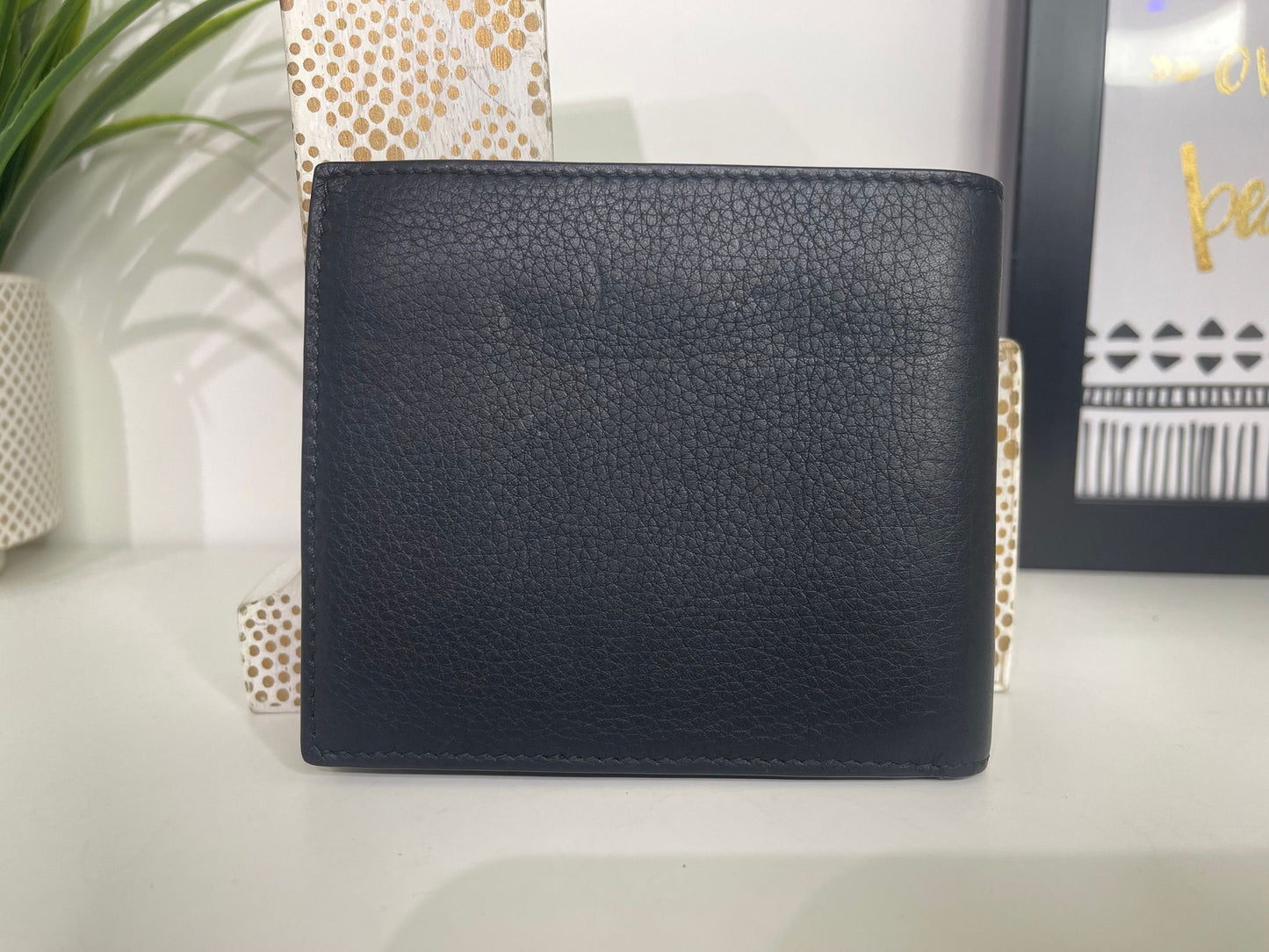 34. Burberry Bifold Wallet