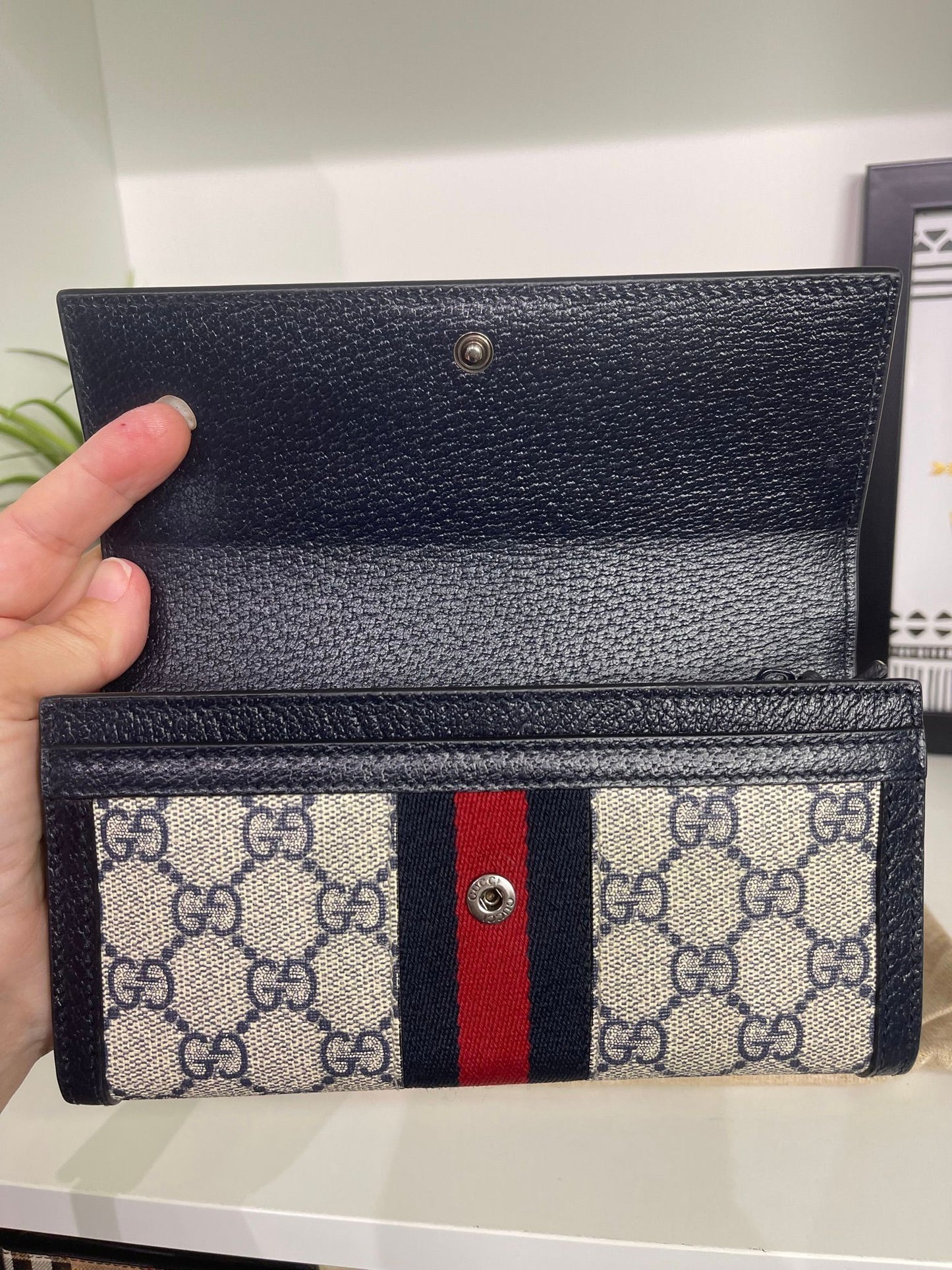 117. Gucci Supreme Navy Long Wallet