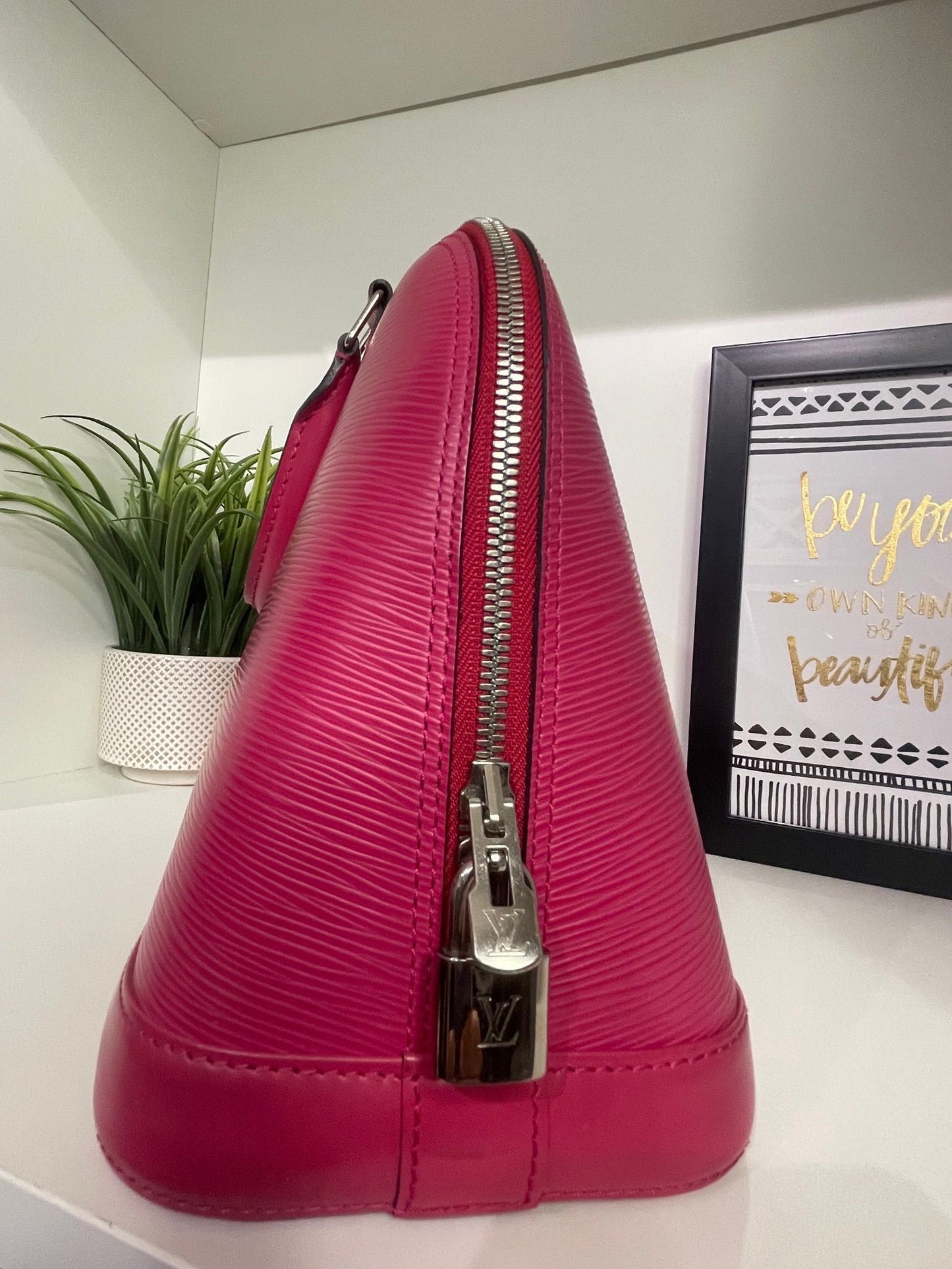 1. Louis Vuitton Pink Epi Alma PM
