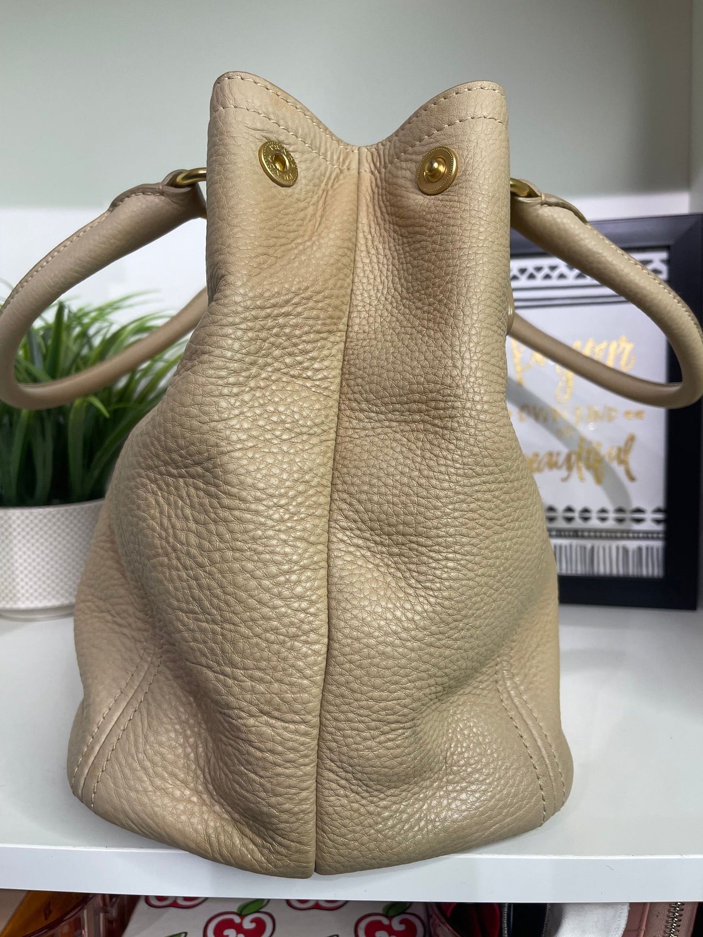 44. Prada Beige Hobo Bag