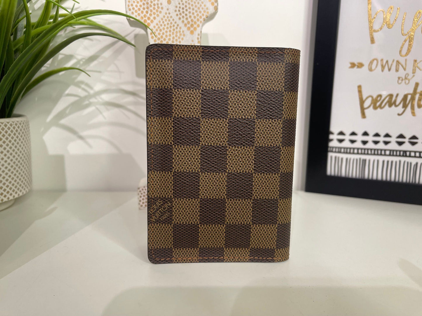 18. Louis Vuitton Damier Ebene Passport Holder