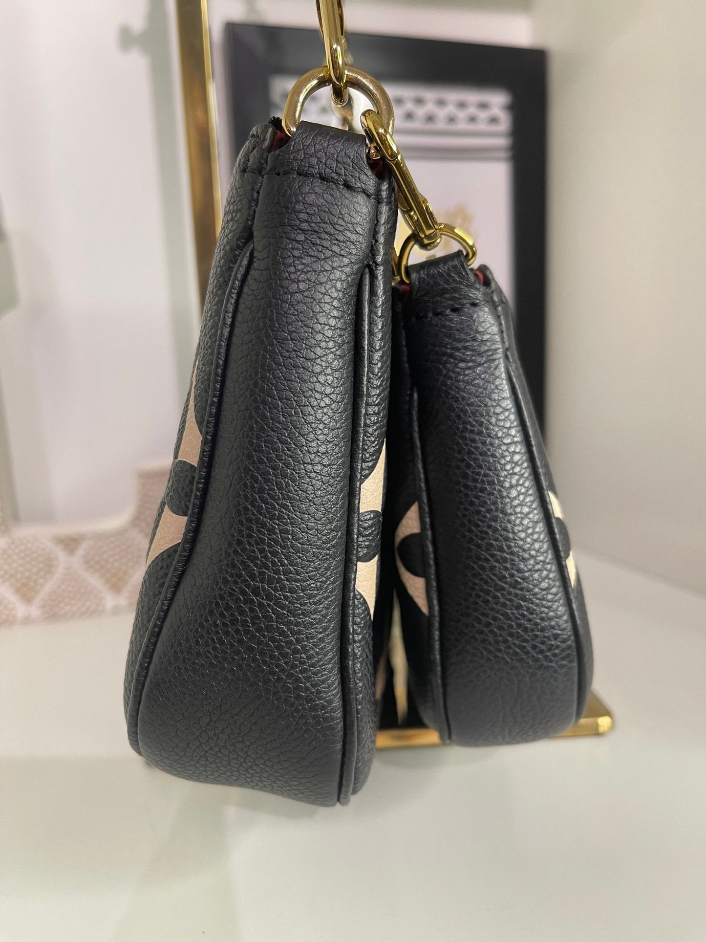 95. Louis Vuitton Multi Bicolor Pouchette
