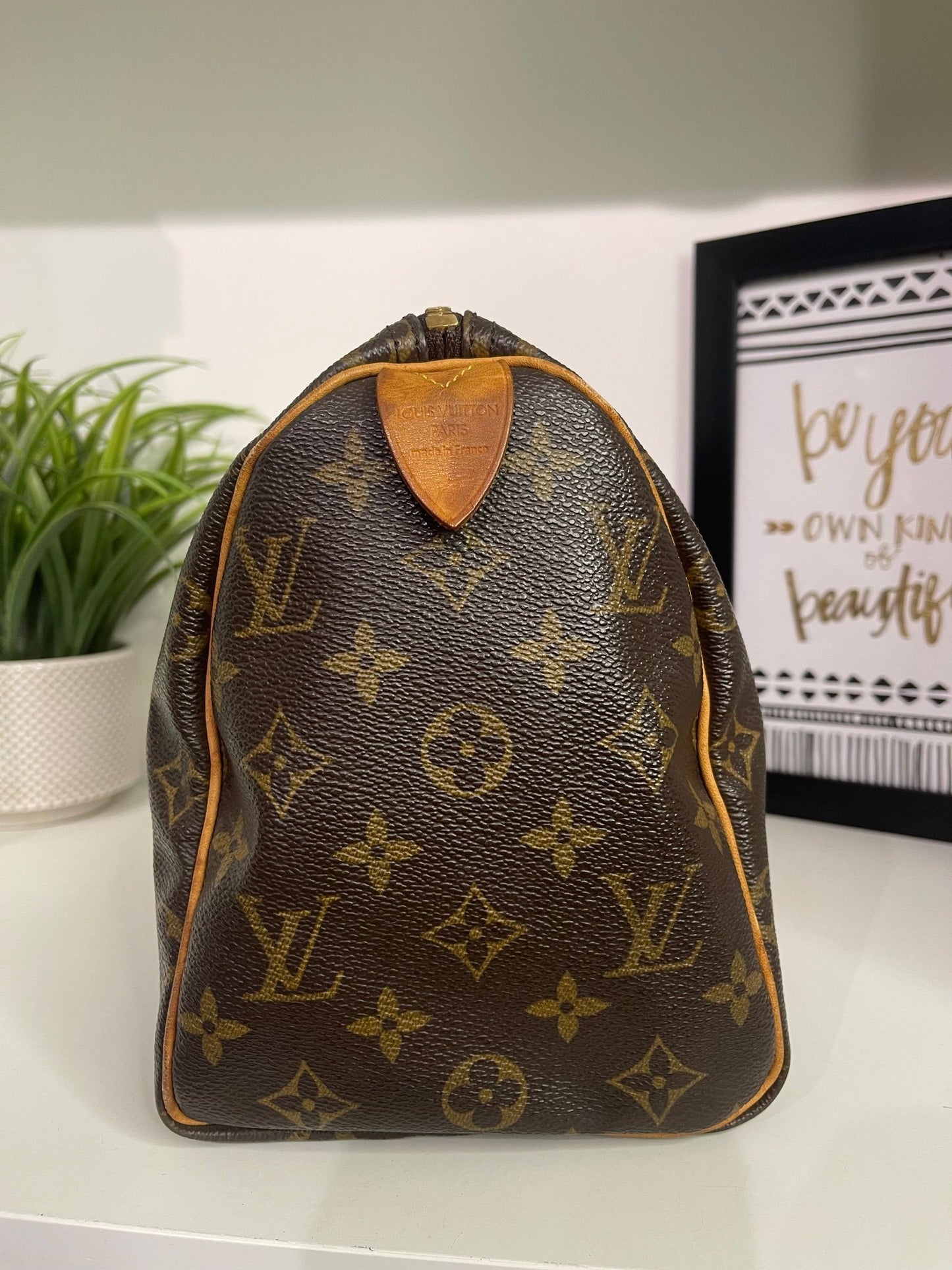 61. Louis Vuitton Monogram Speedy 25