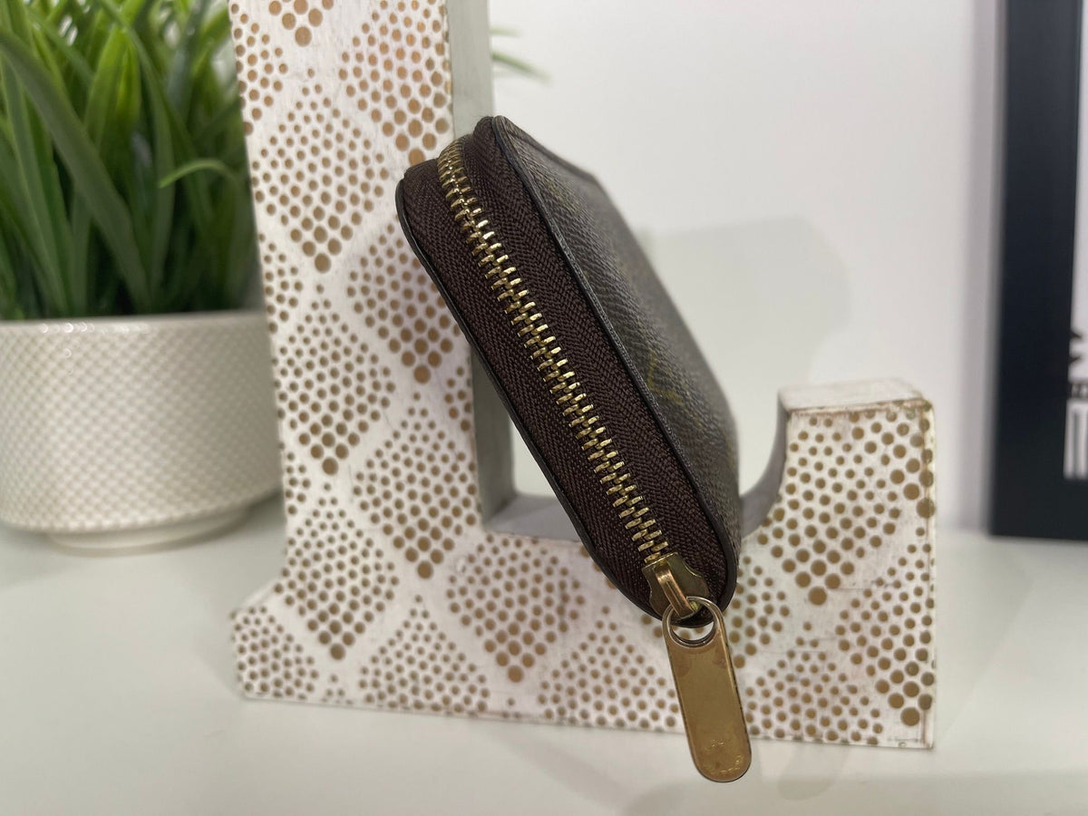 49. Louis Vuitton Monogram Zippy Card Holder