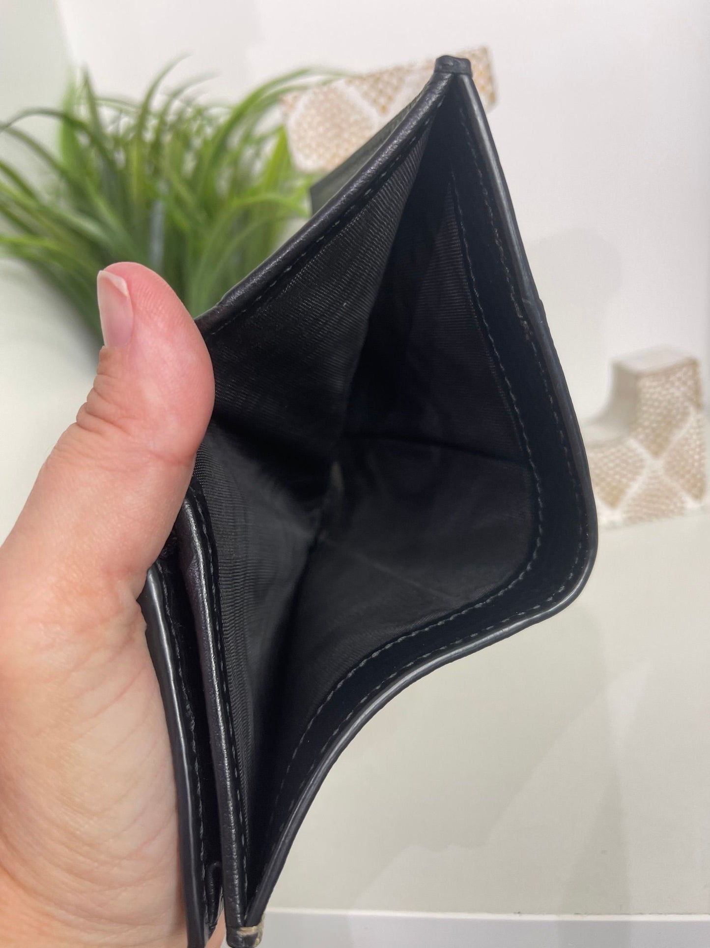 76. Gucci Supreme Compact Wallet Black Leather Trim