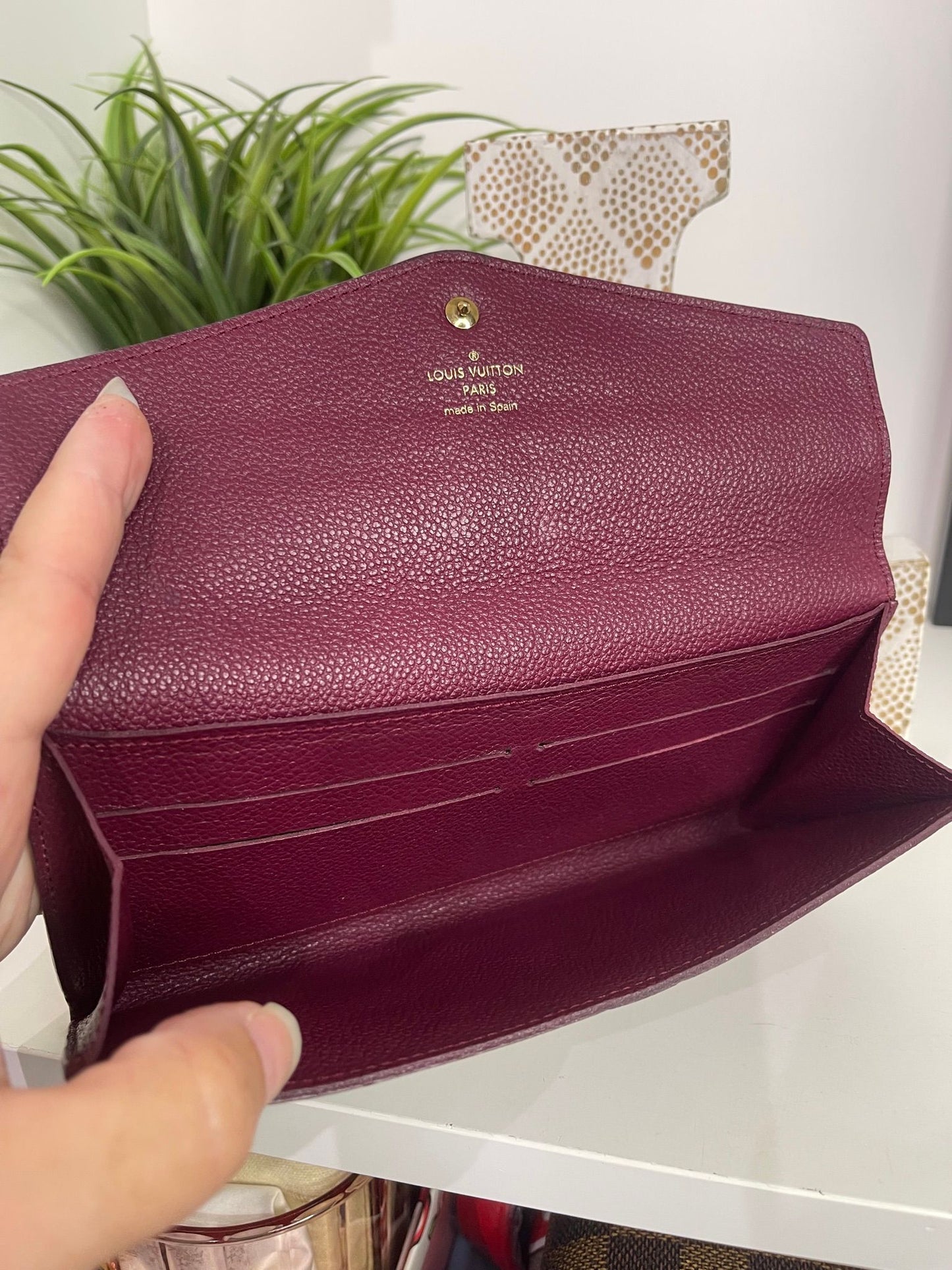 112. Louis Vuitton Aurore Monogram Empreinte Leather Curieuse Wallet