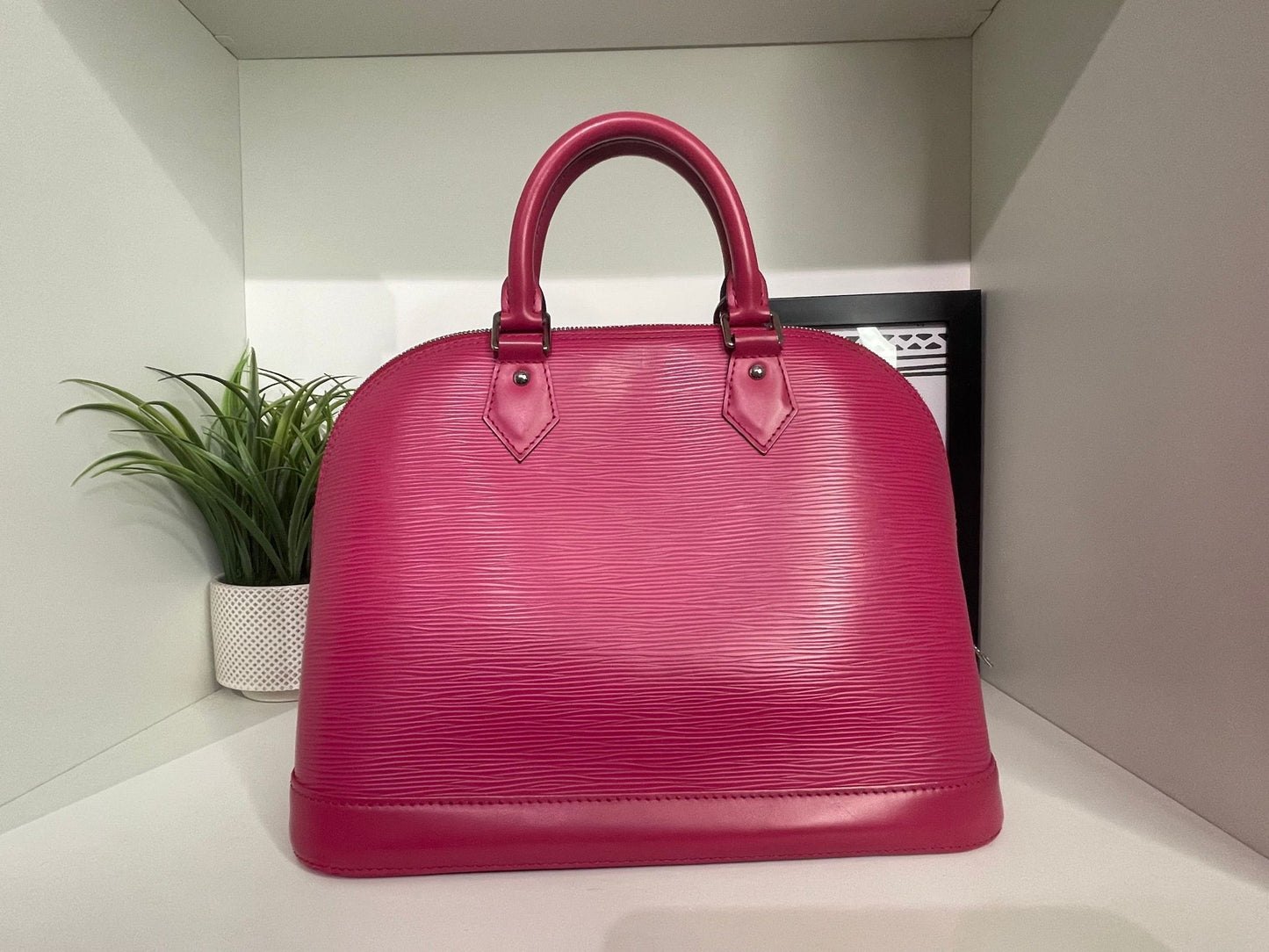 1. Louis Vuitton Pink Epi Alma PM