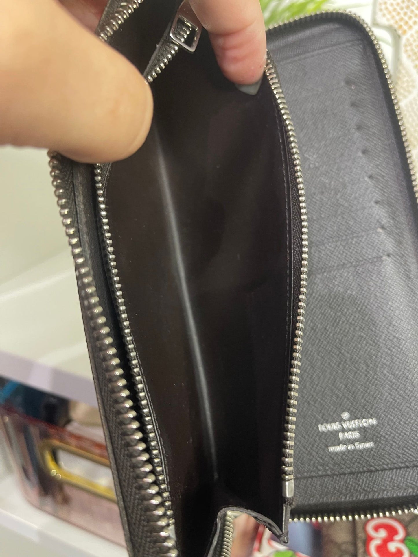 43. Louis Vuitton Damier Ebene Zippy Wallet