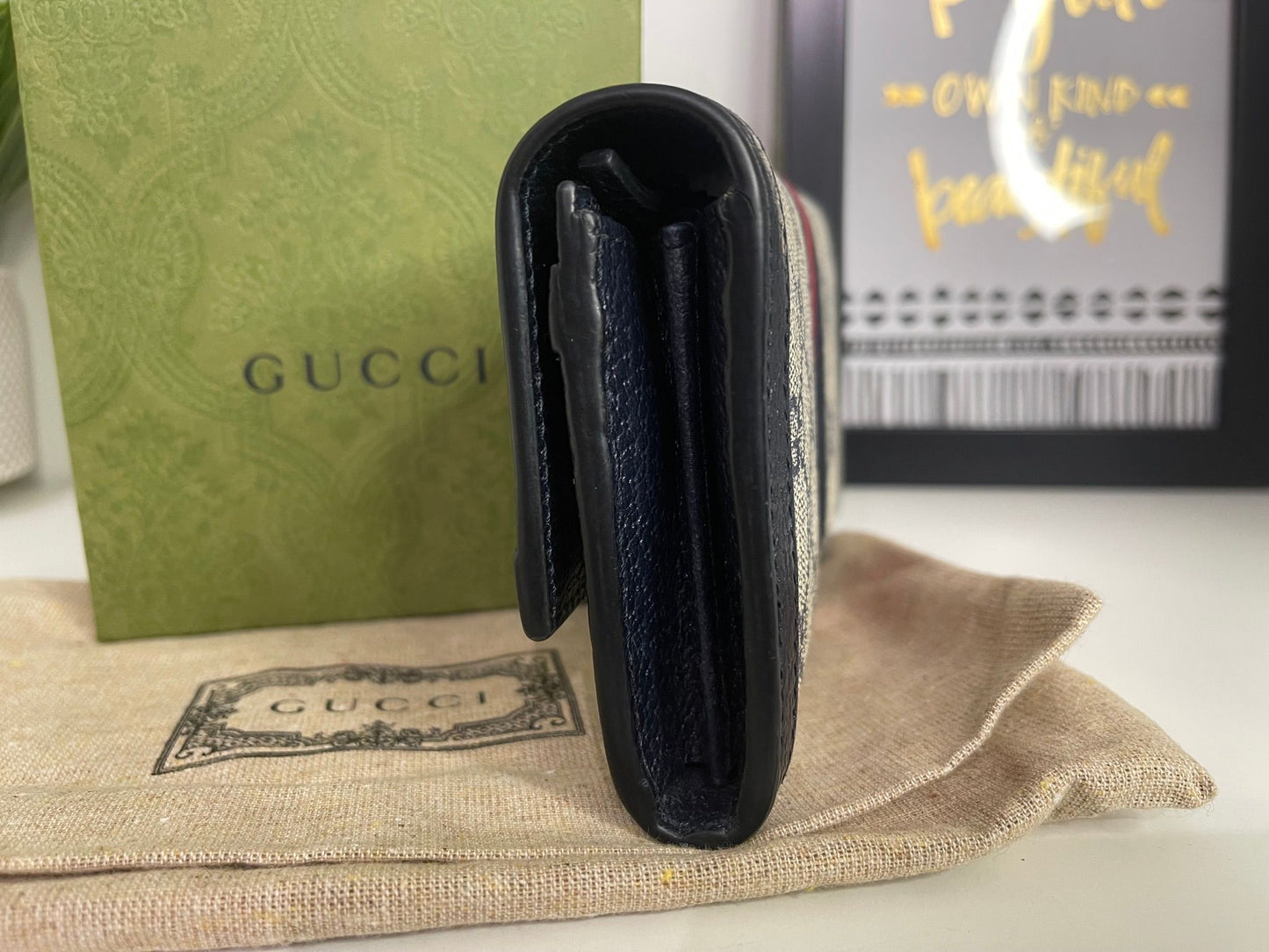 117. Gucci Supreme Navy Long Wallet