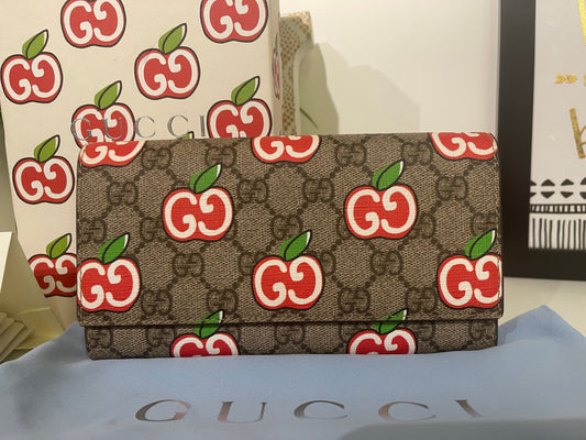 14. Gucci Supreme Apple Wallet