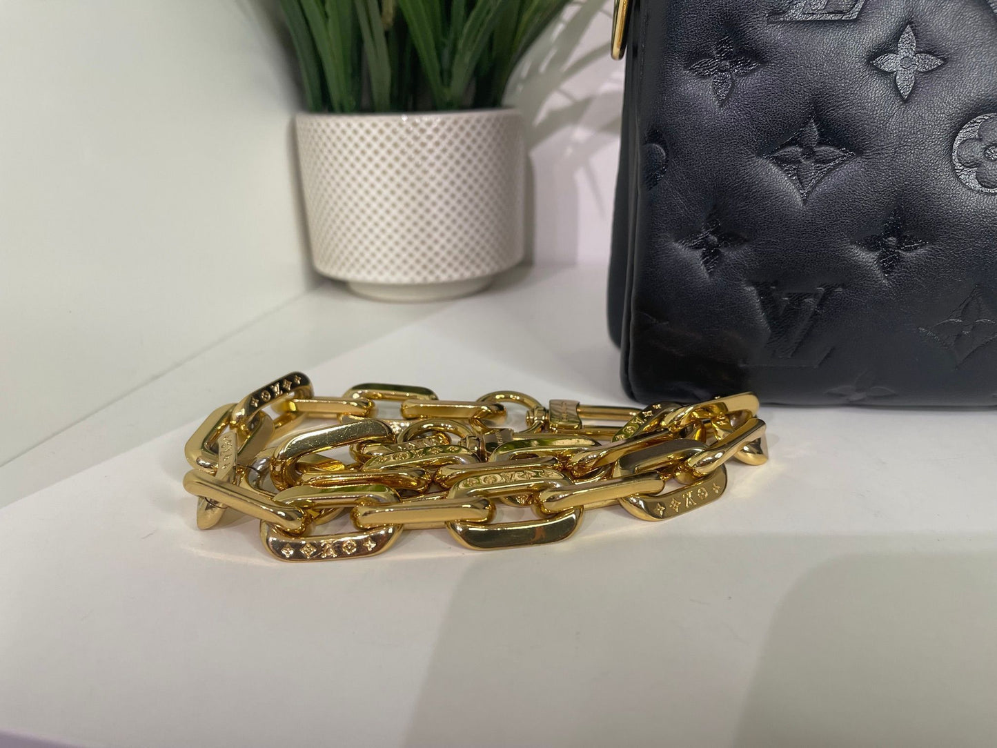 24. Louis Vuitton Black Coussin PM