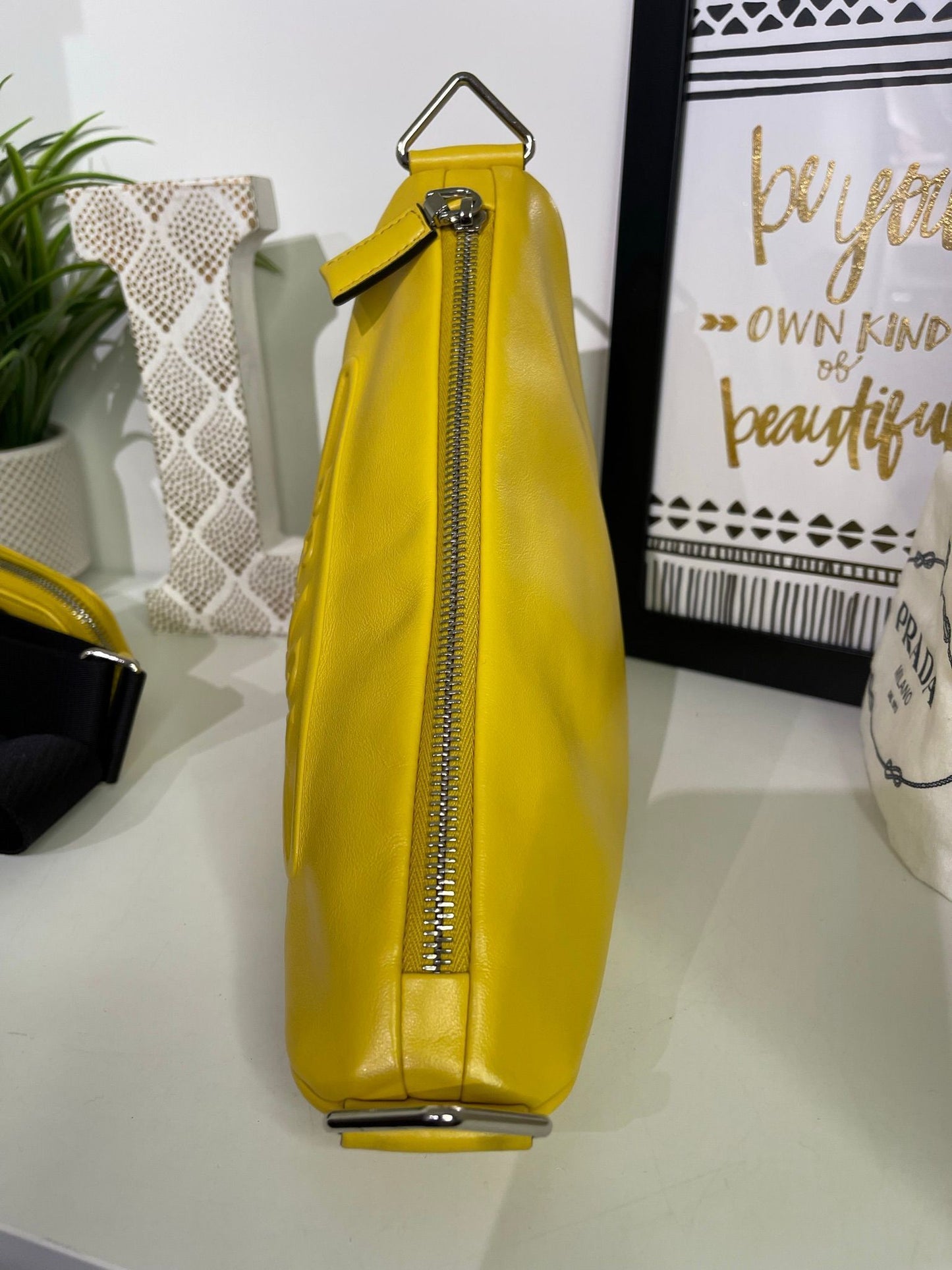 28. Prada Yellow Logo Triangle Crossbody
