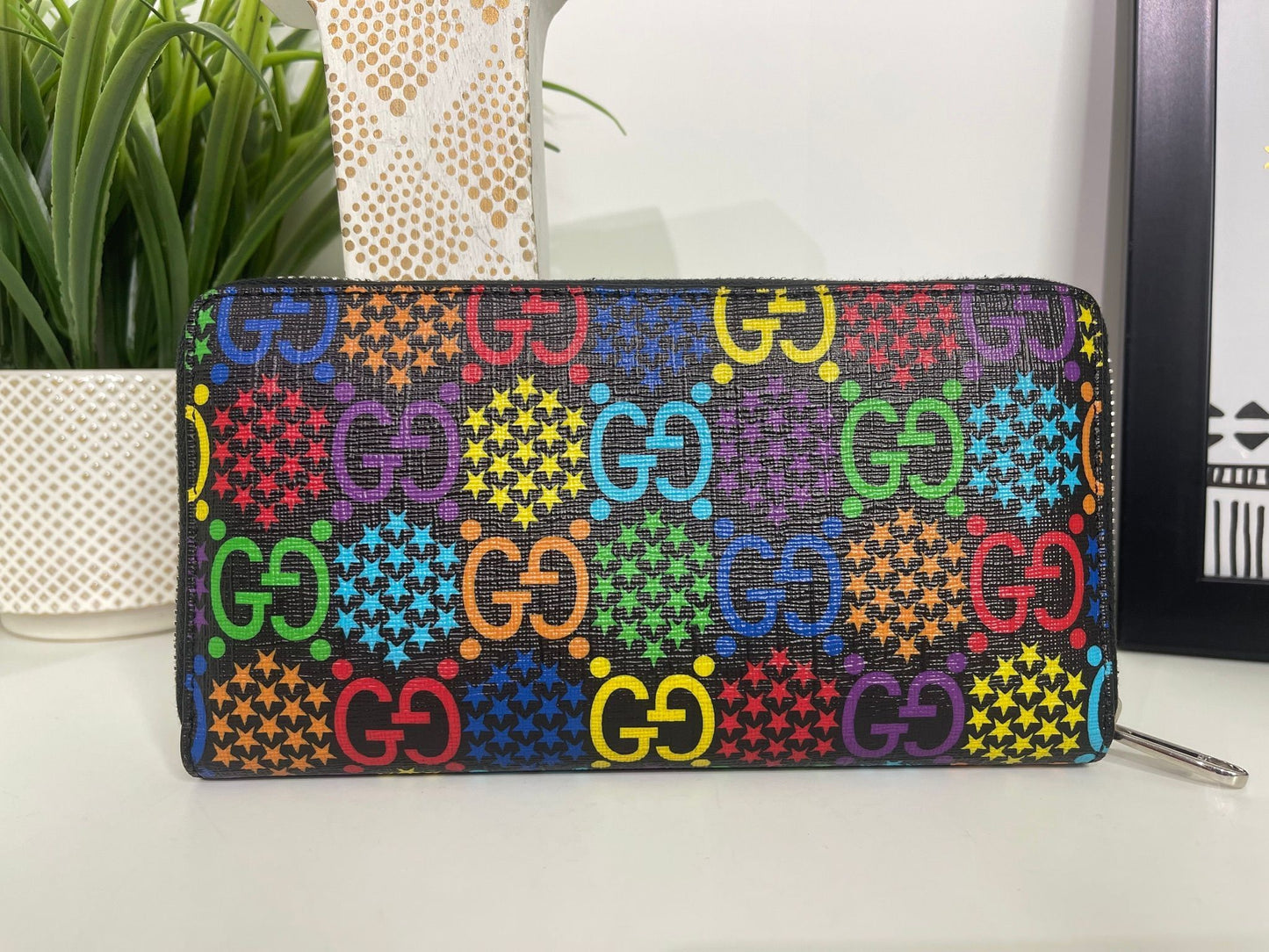 86. Gucci Psychedelic Zippy Wallet
