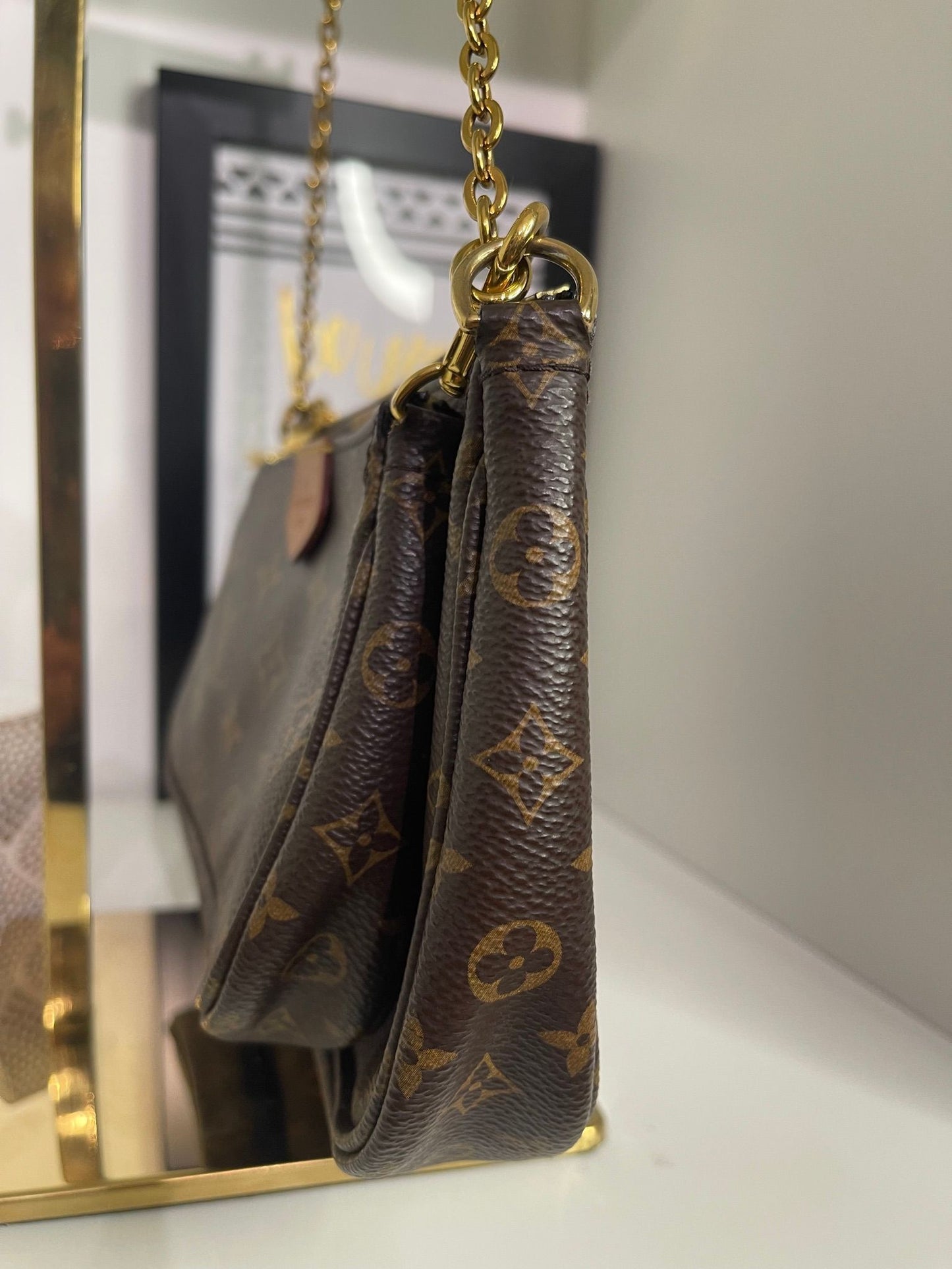 32. Louis Vuitton Monogram Multi Pouchette