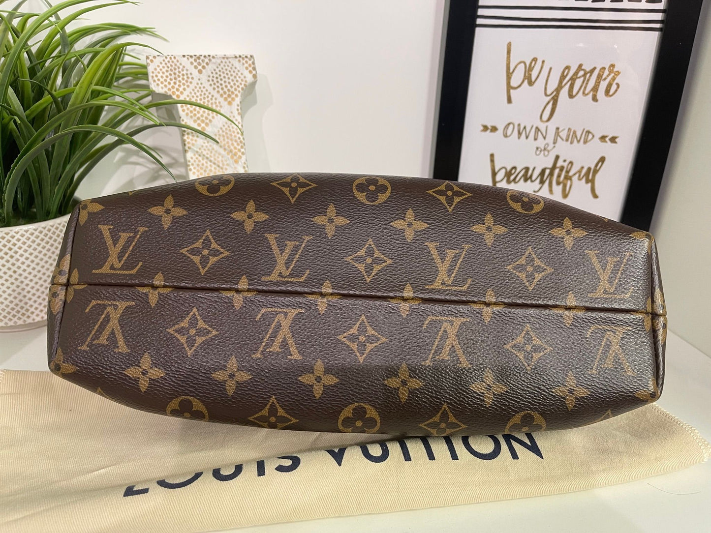 69. Louis Vuitton Monogram 2 Way Clutch