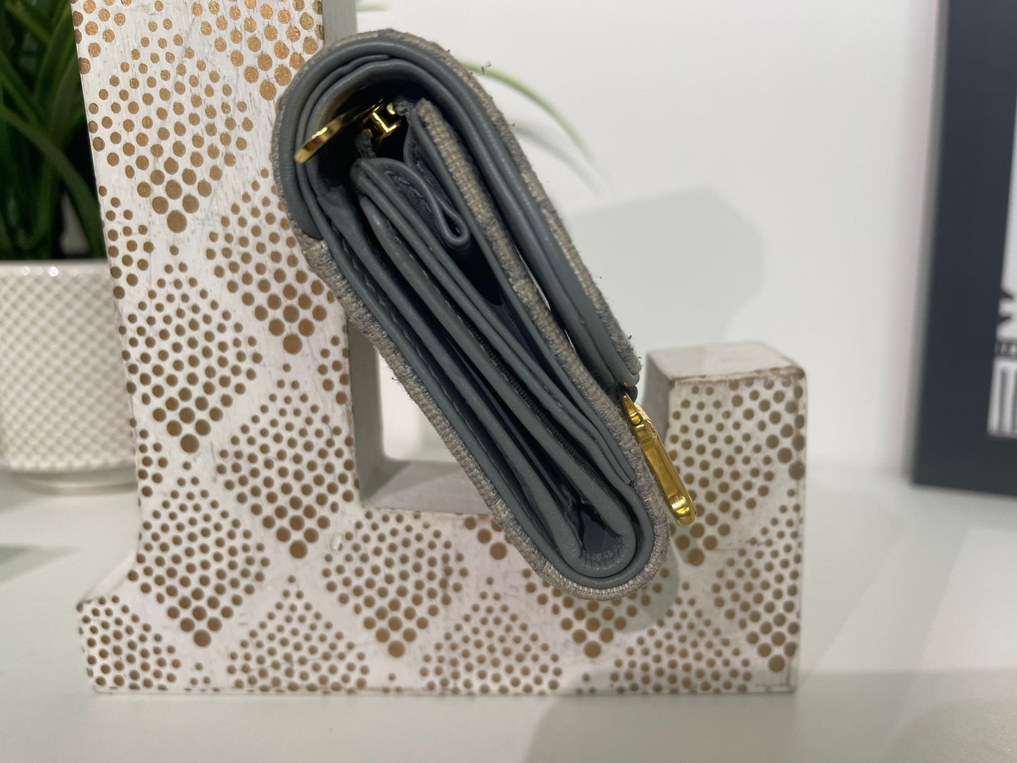 80. Christian Dior Oblique Saddle Lotus Trifold Wallet