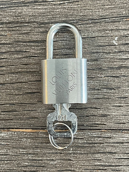 149. Louis Vuitton Silver Lock & Key #323