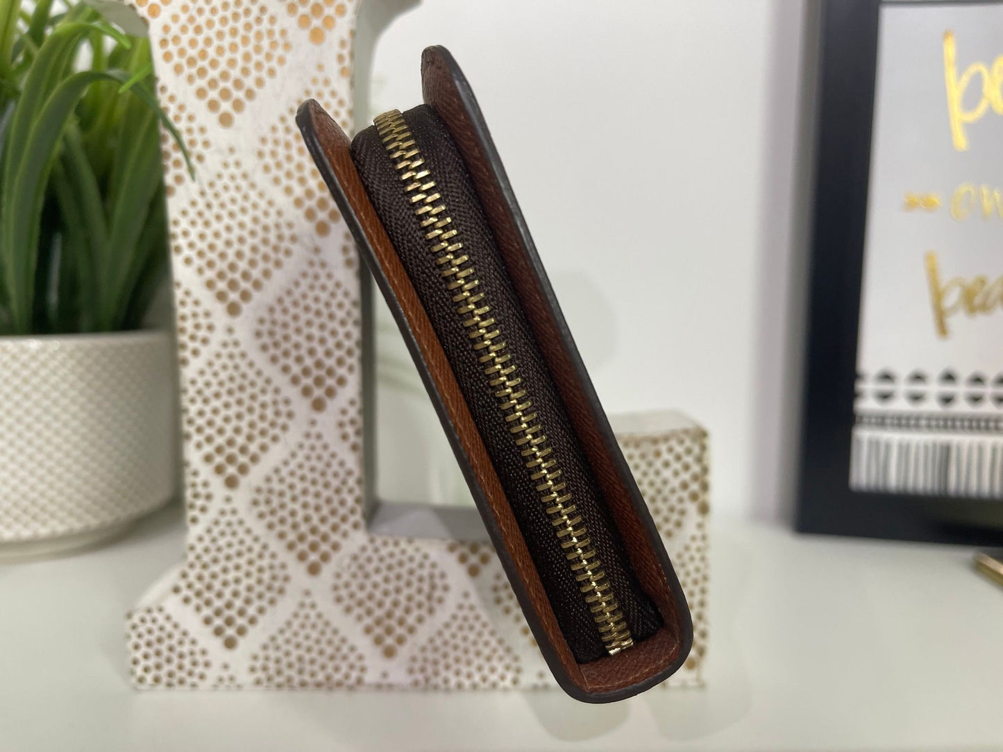 120. Louis Vuitton Monogram Porte Monnaie Zip Wallet