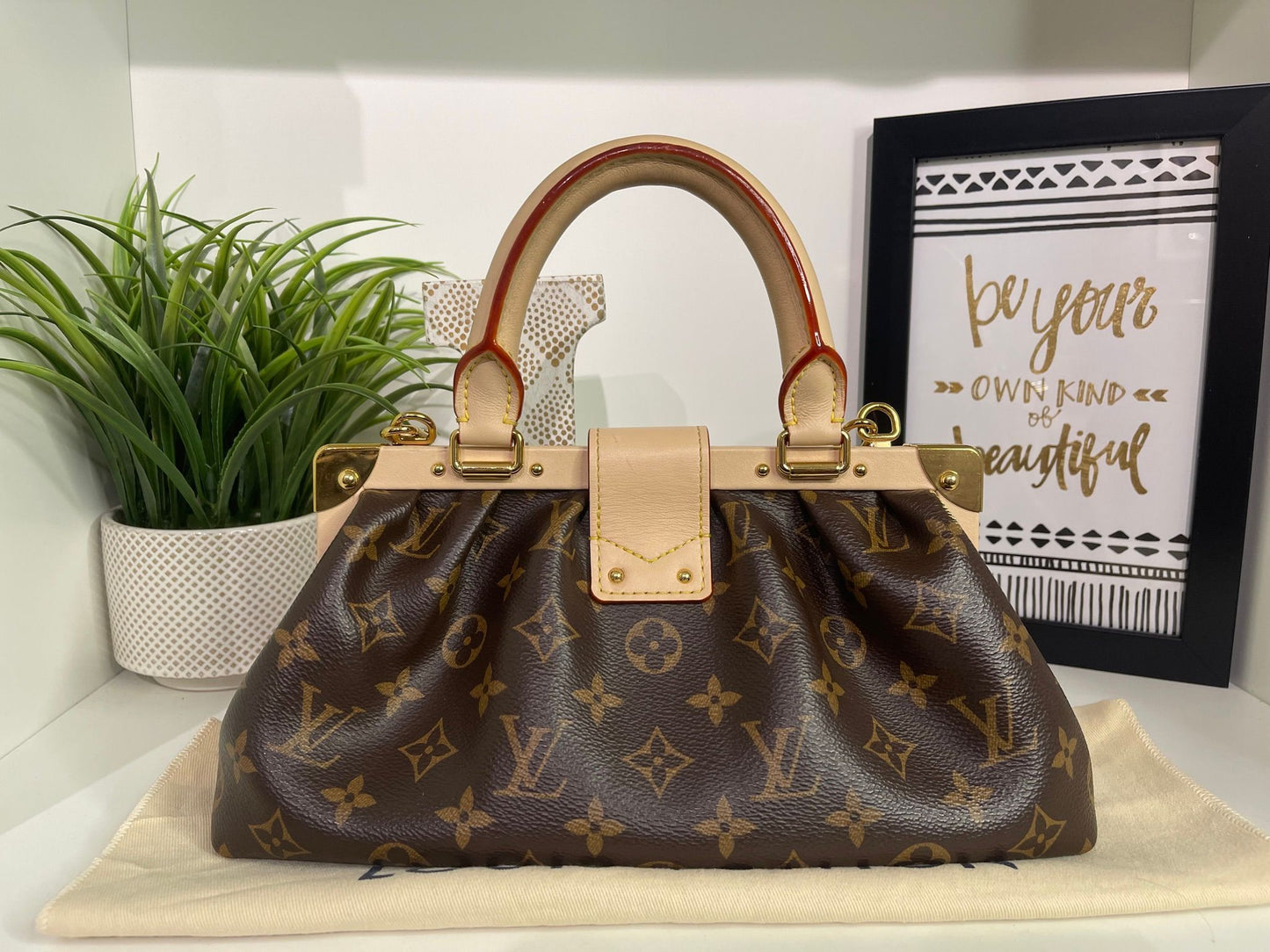 69. Louis Vuitton Monogram 2 Way Clutch