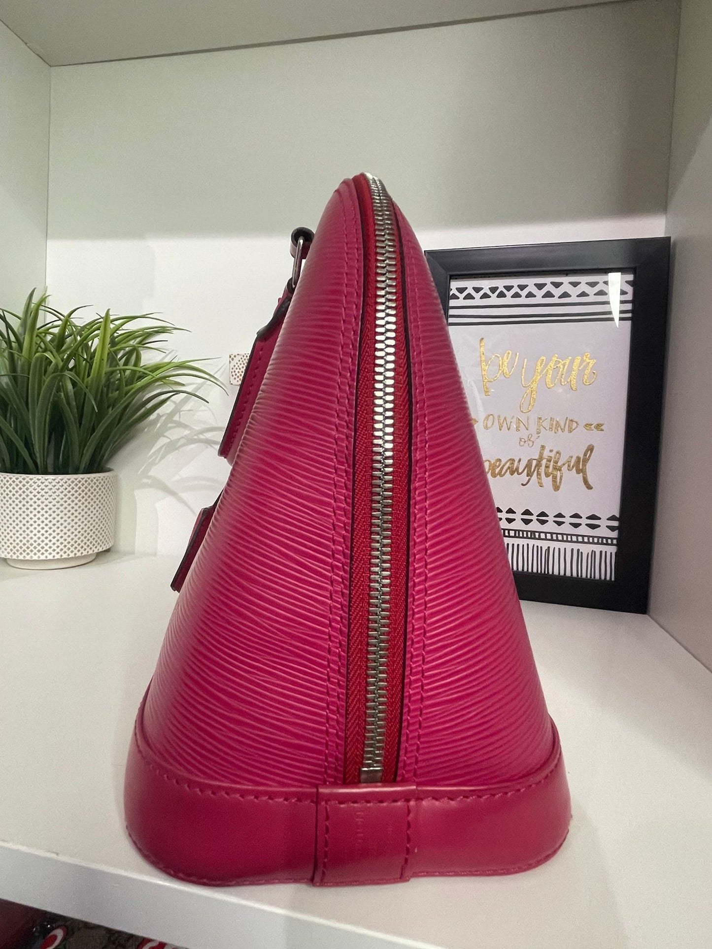 1. Louis Vuitton Pink Epi Alma PM