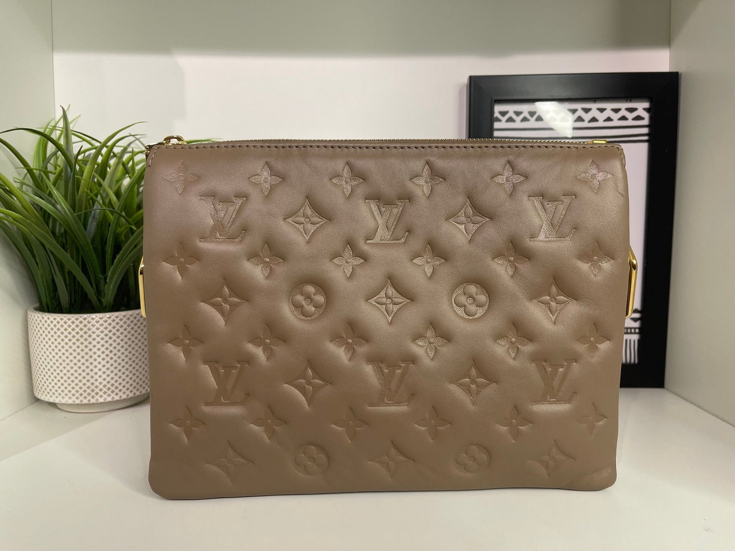 88. Louis Vuitton Mocha Coussin PM