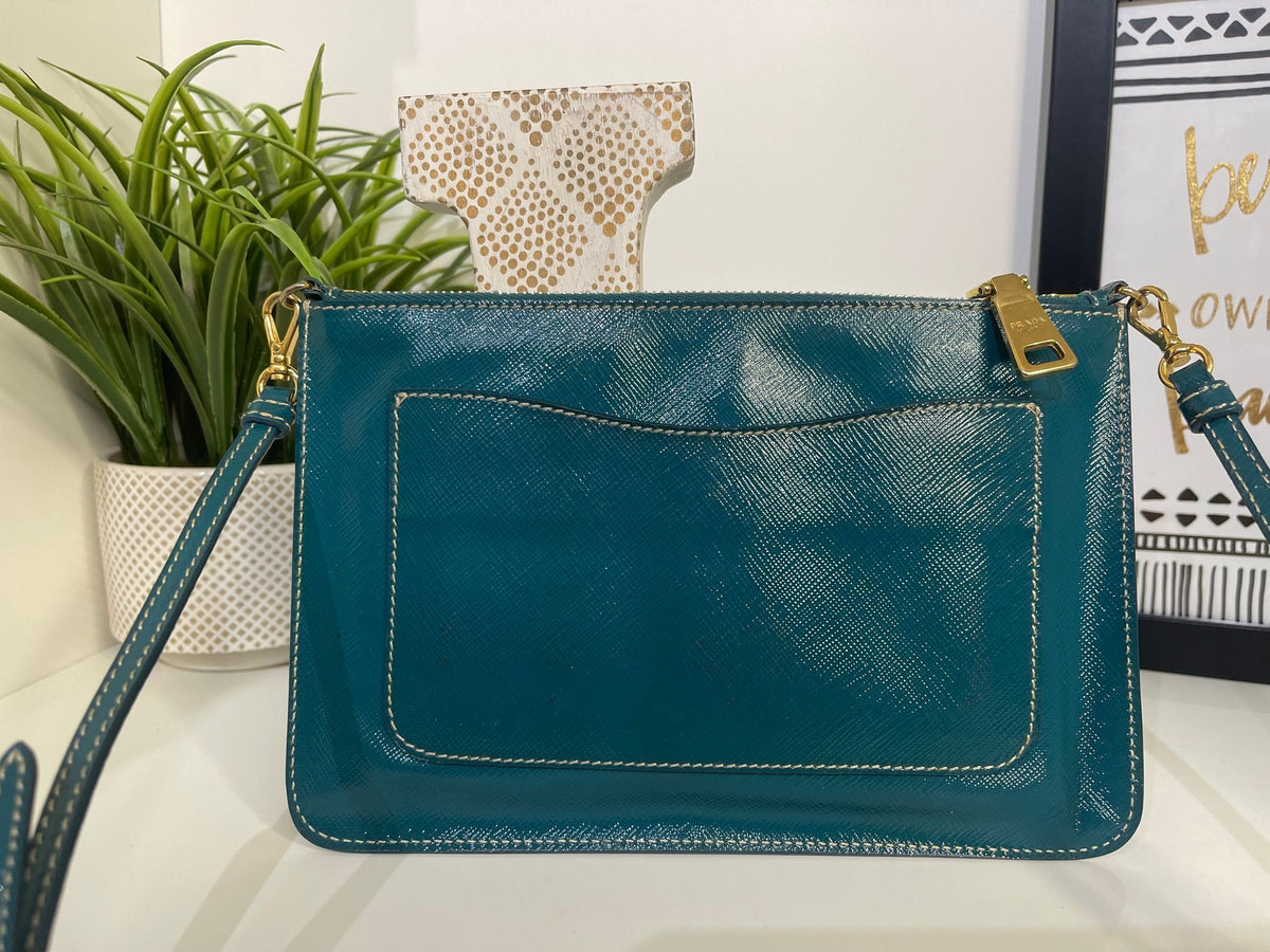 49. Prada Teal Pouchette Crossbody