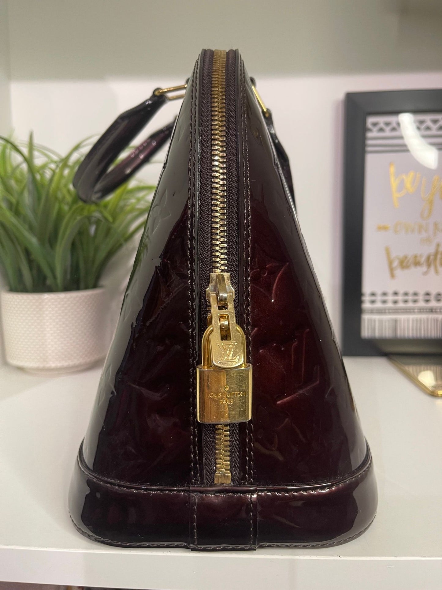 130. Louis Vuitton Vernis Amarante Alma PM
