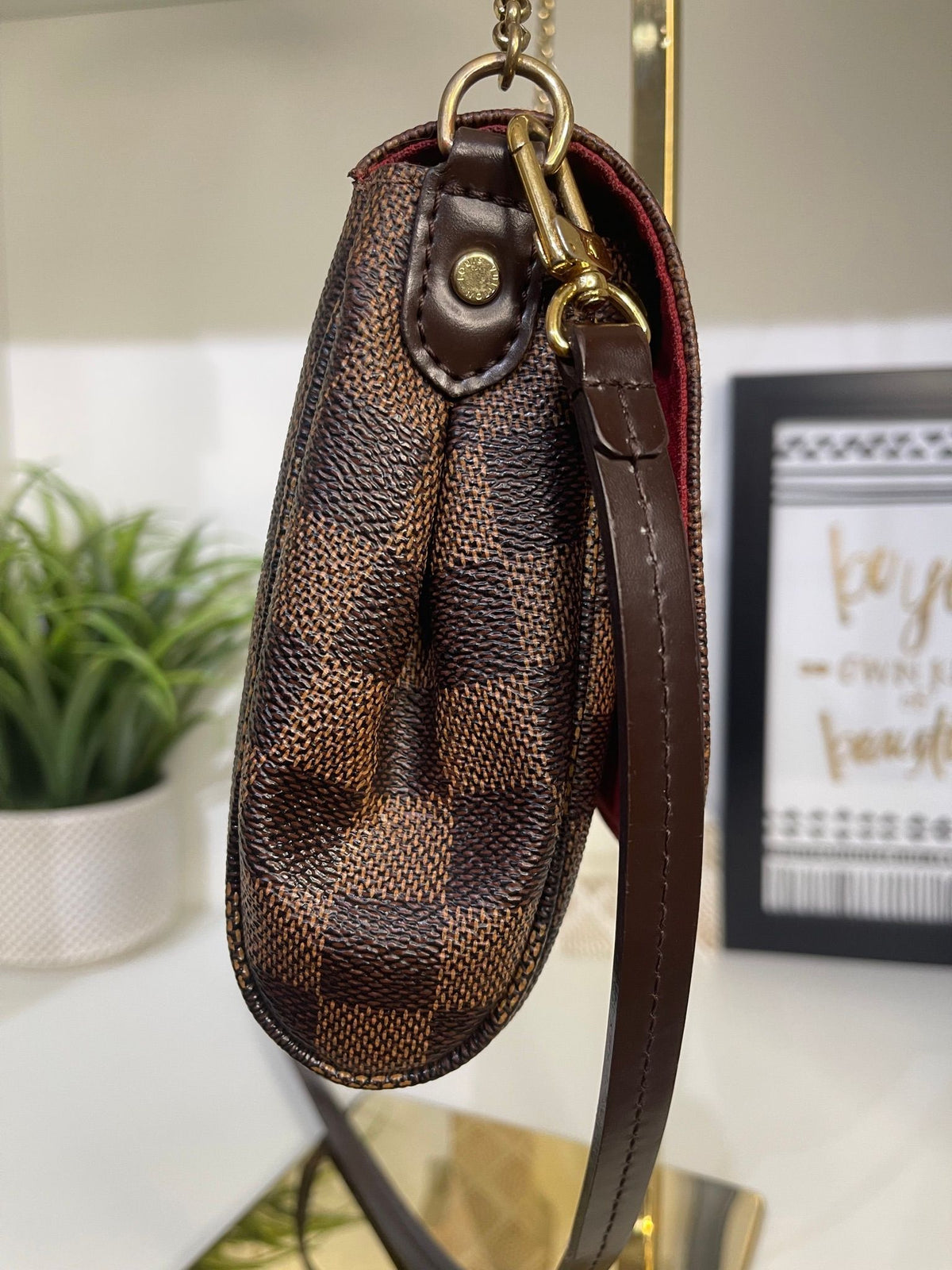 4. Louis Vuitton Damier Ebene Favorite MM