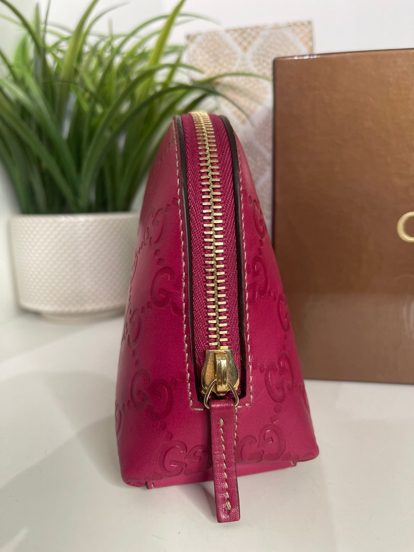 121. Gucci Fuscia Cosmetic Bag
