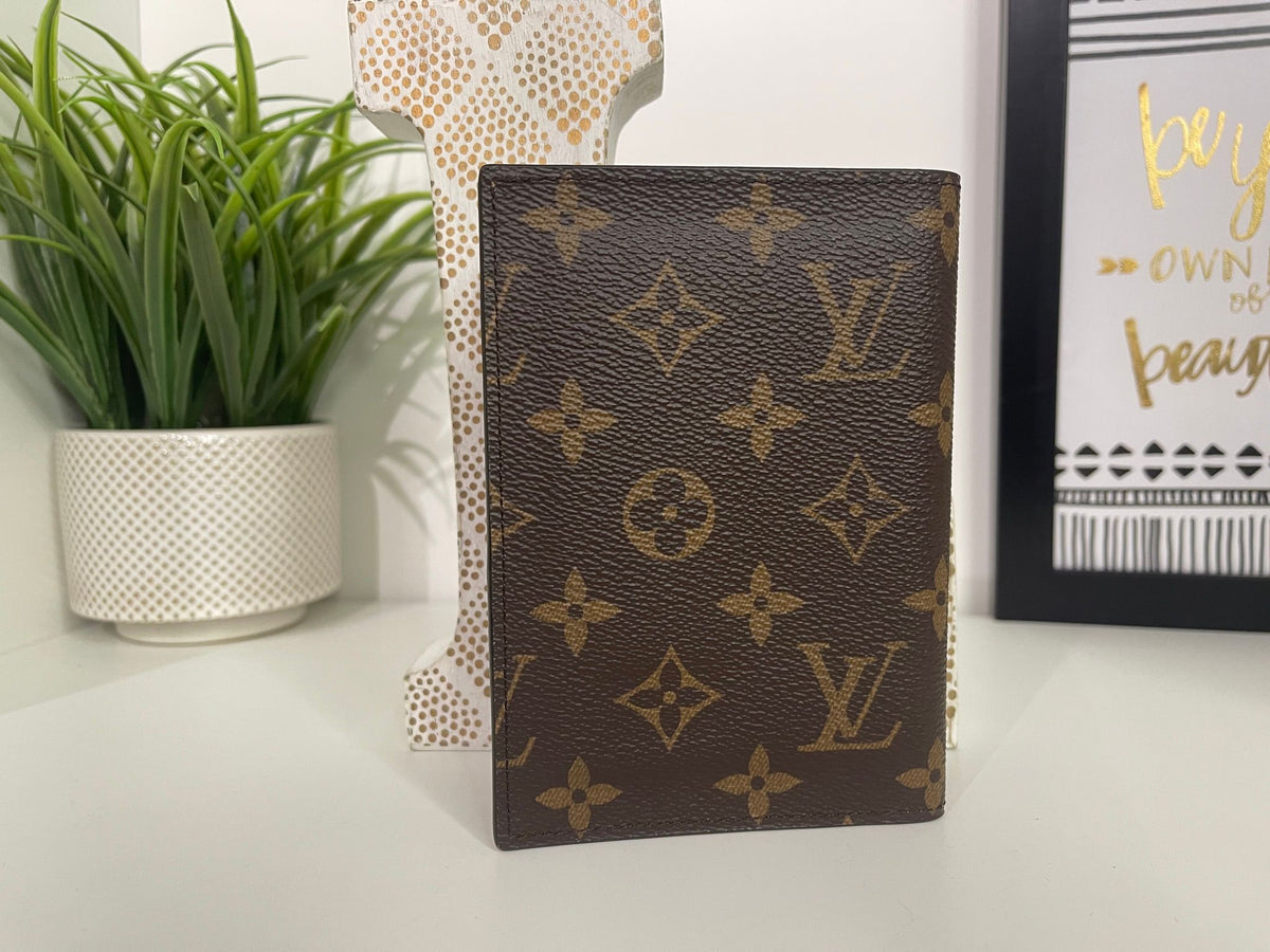 84. Louis Vuitton Monogram Passport Cover