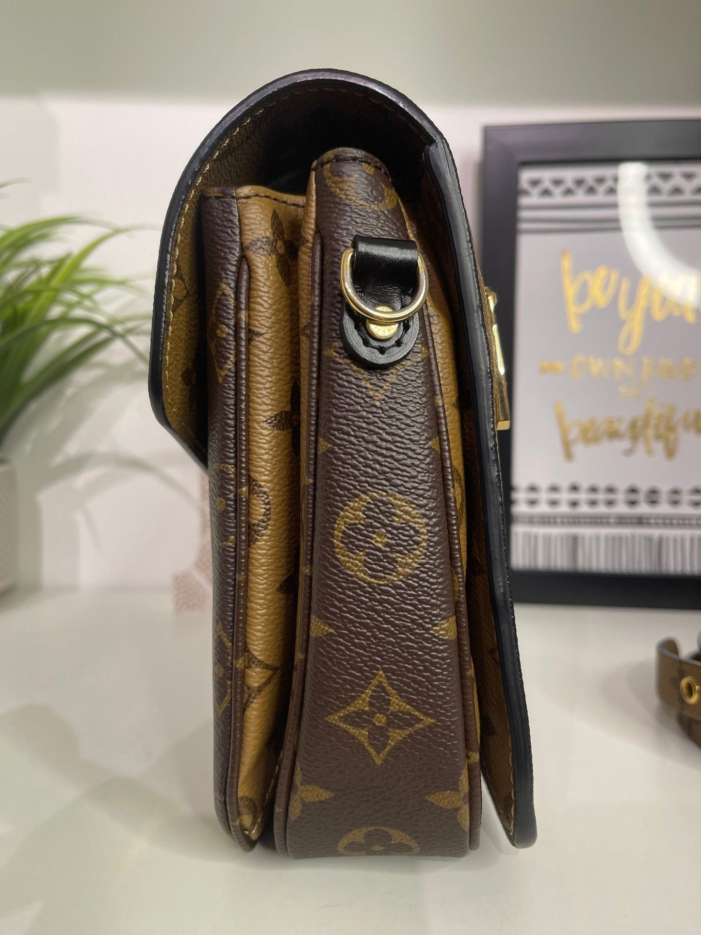 94. Louis Vuitton Reverse Monogram Pouchette Metis