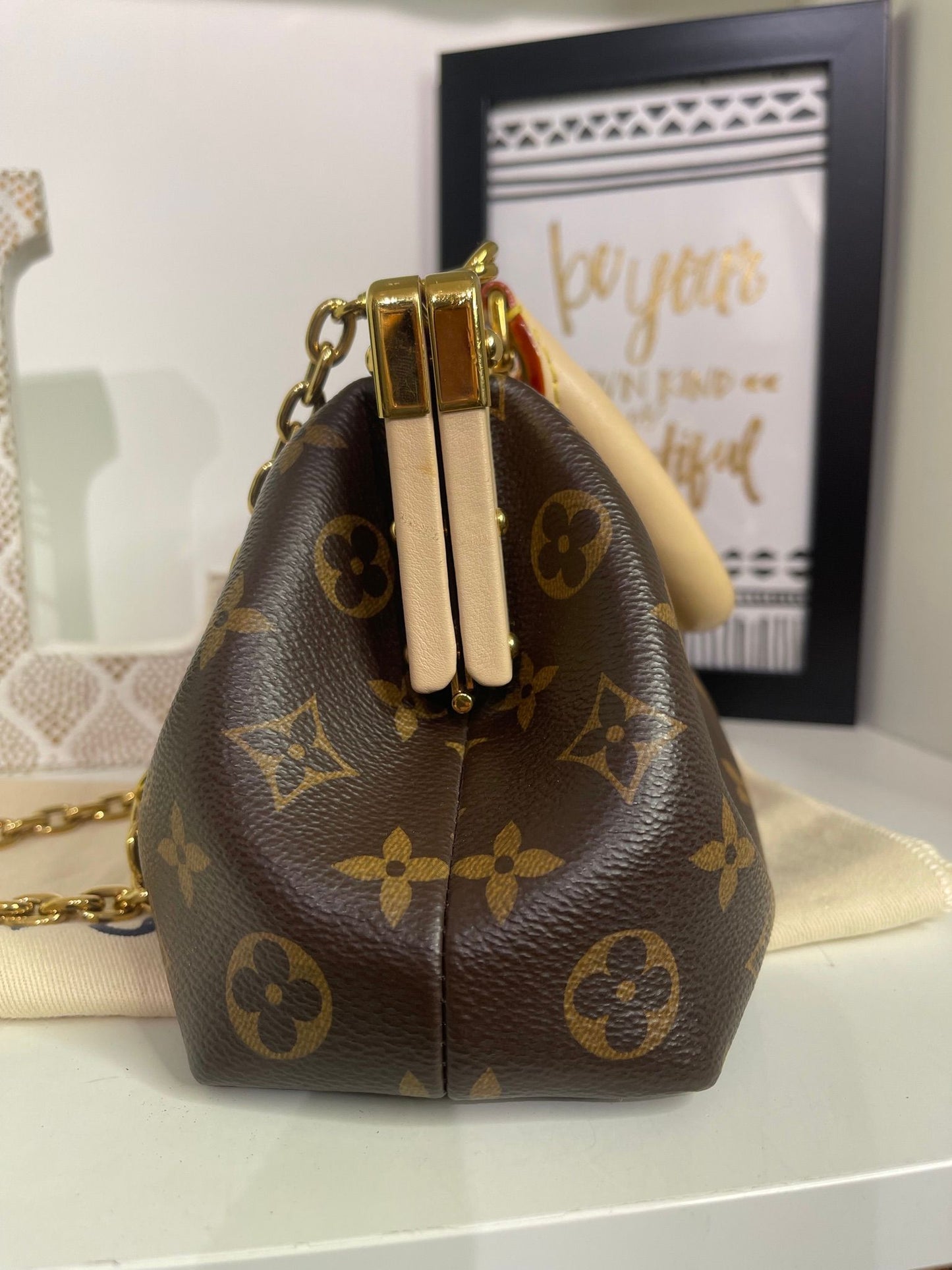 69. Louis Vuitton Monogram 2 Way Clutch