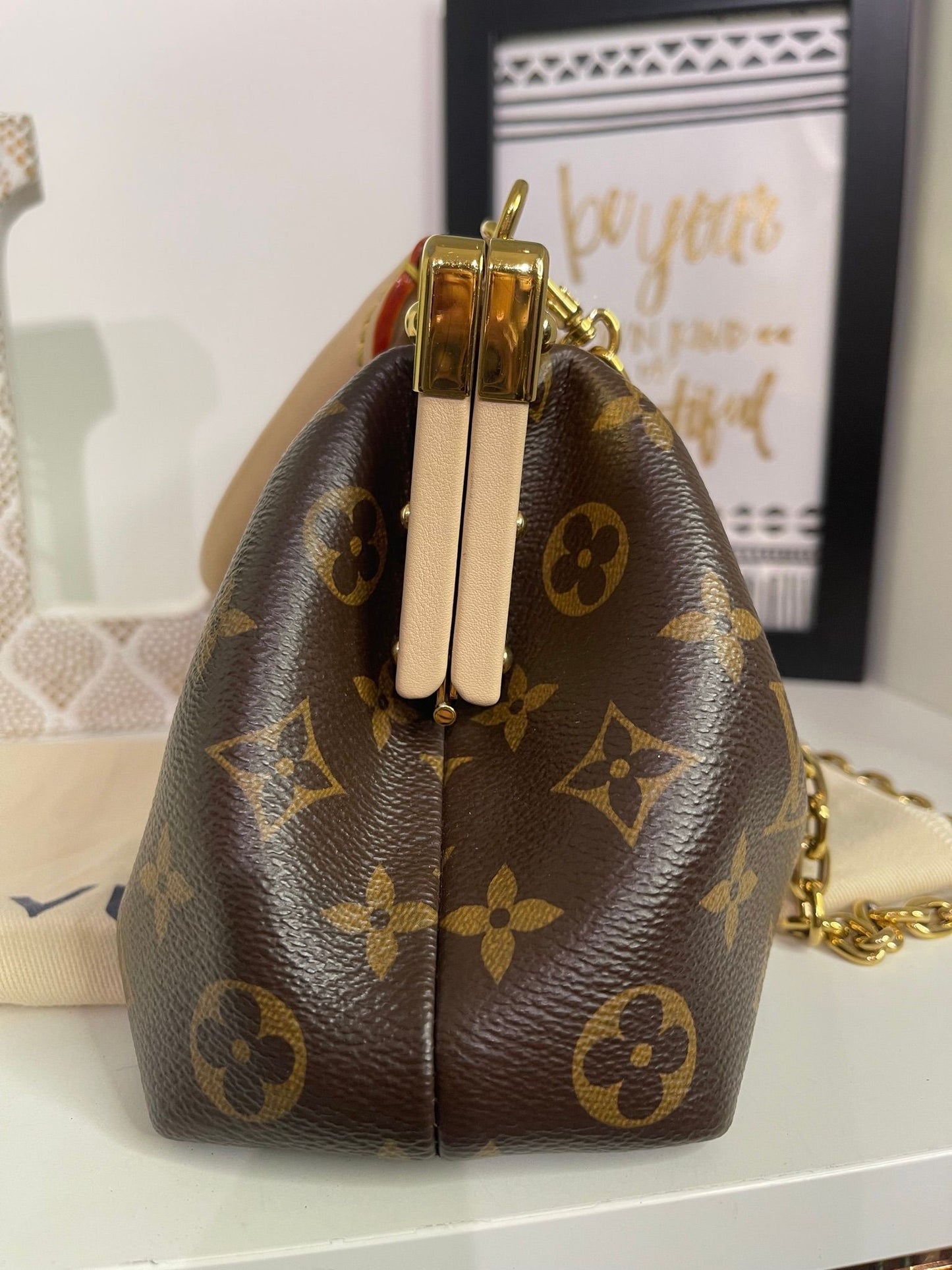 69. Louis Vuitton Monogram 2 Way Clutch