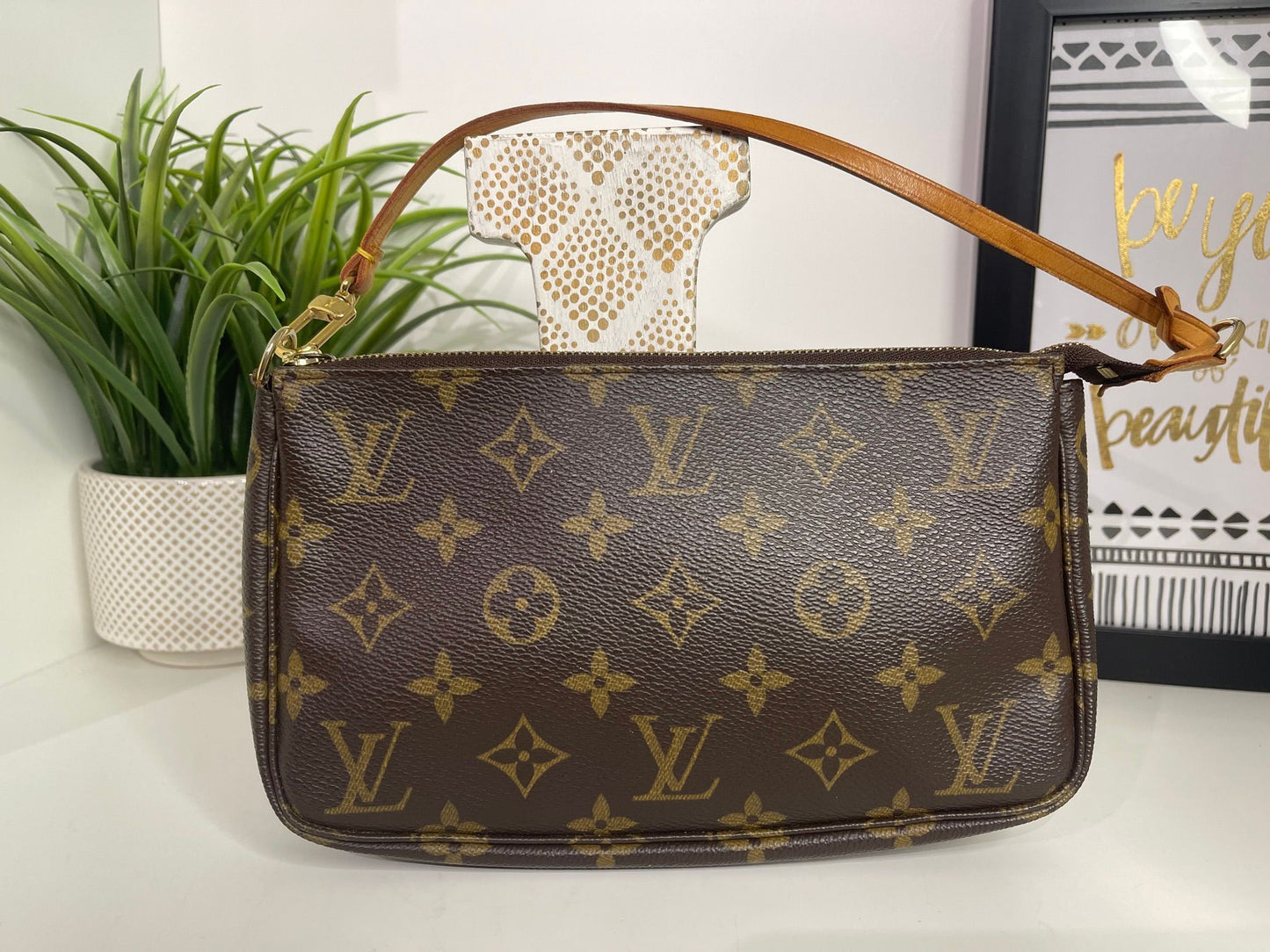 71. Louis Vuitton Monogram Pouchette