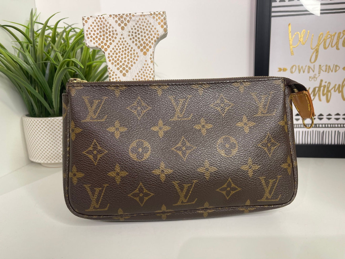 70. Louis Vuitton Monogram Pouchette