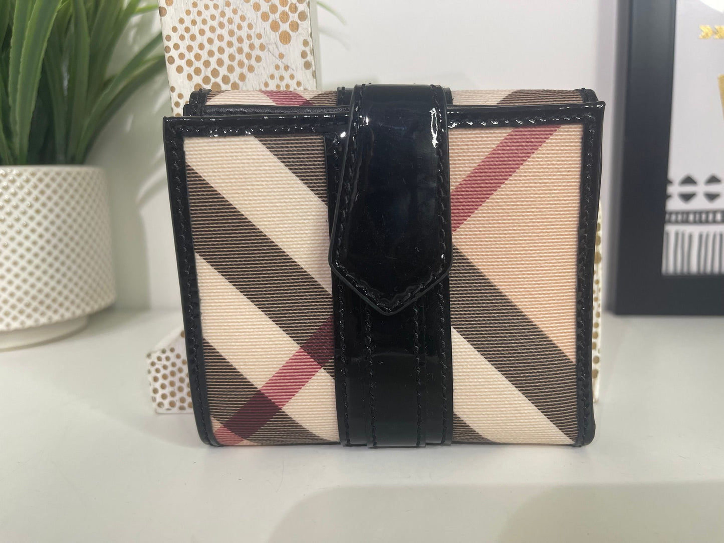 67. Burberry Compact Wallet