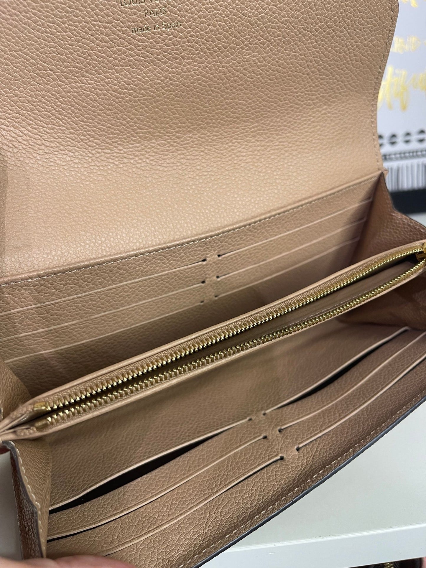 74. Louis Vuitton Nude Empriente Sarah Wallet