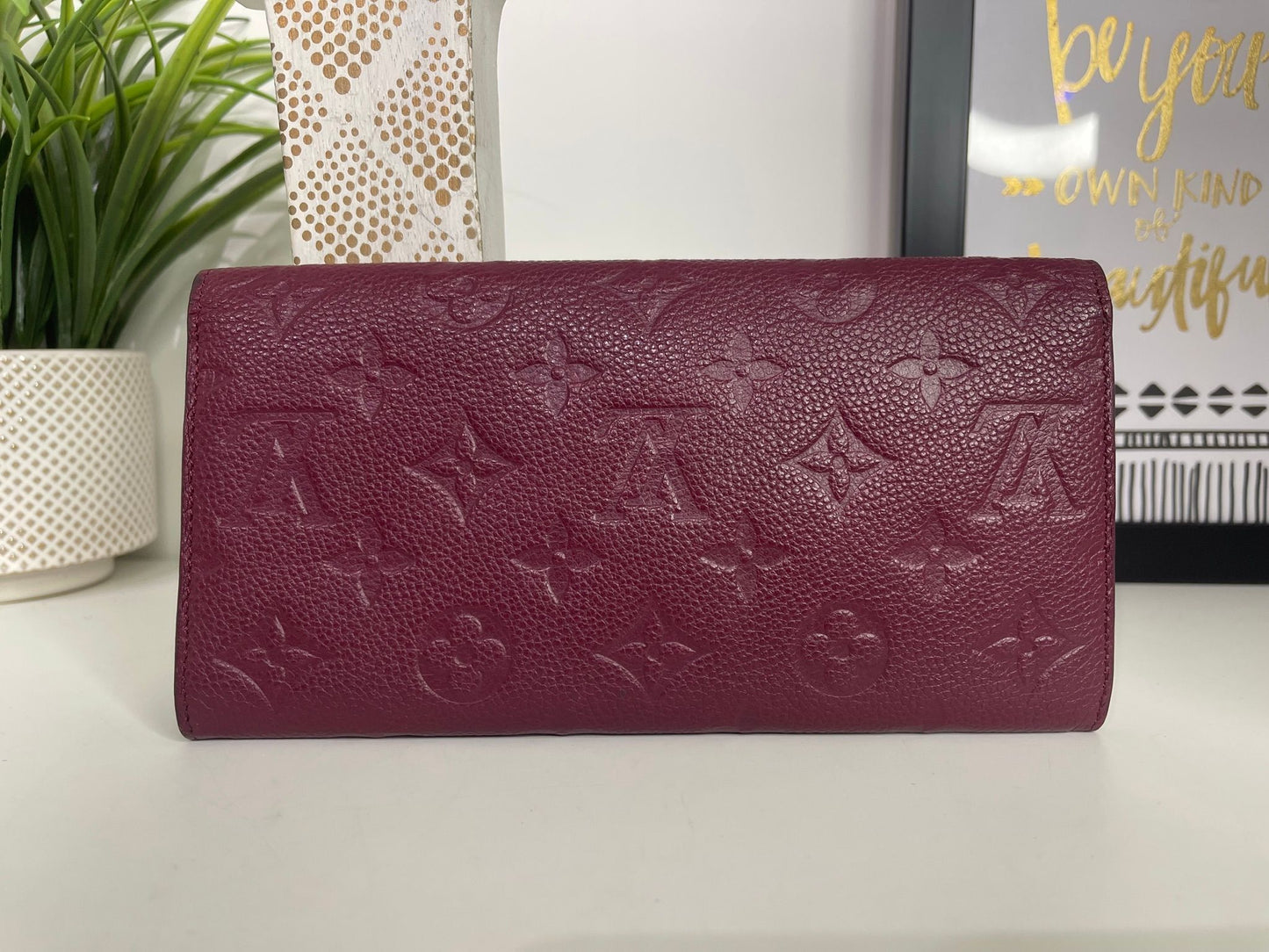 112. Louis Vuitton Aurore Monogram Empreinte Leather Curieuse Wallet