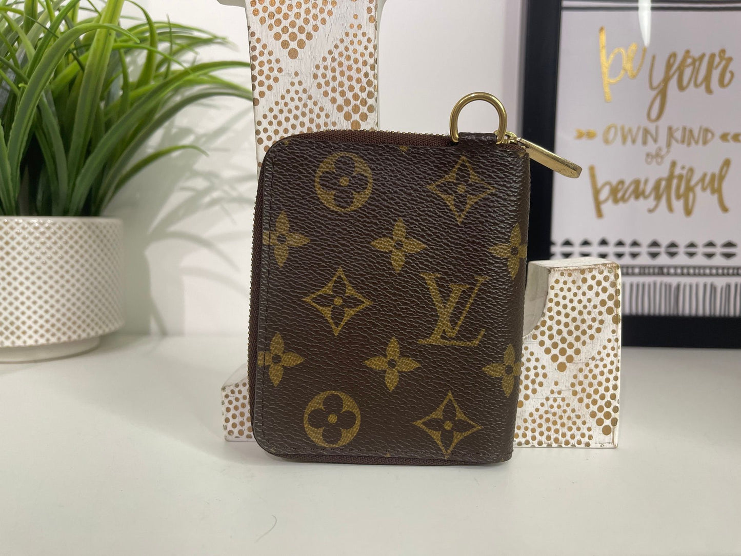 12. Louis Vuitton Monogram Zippy Card Holder