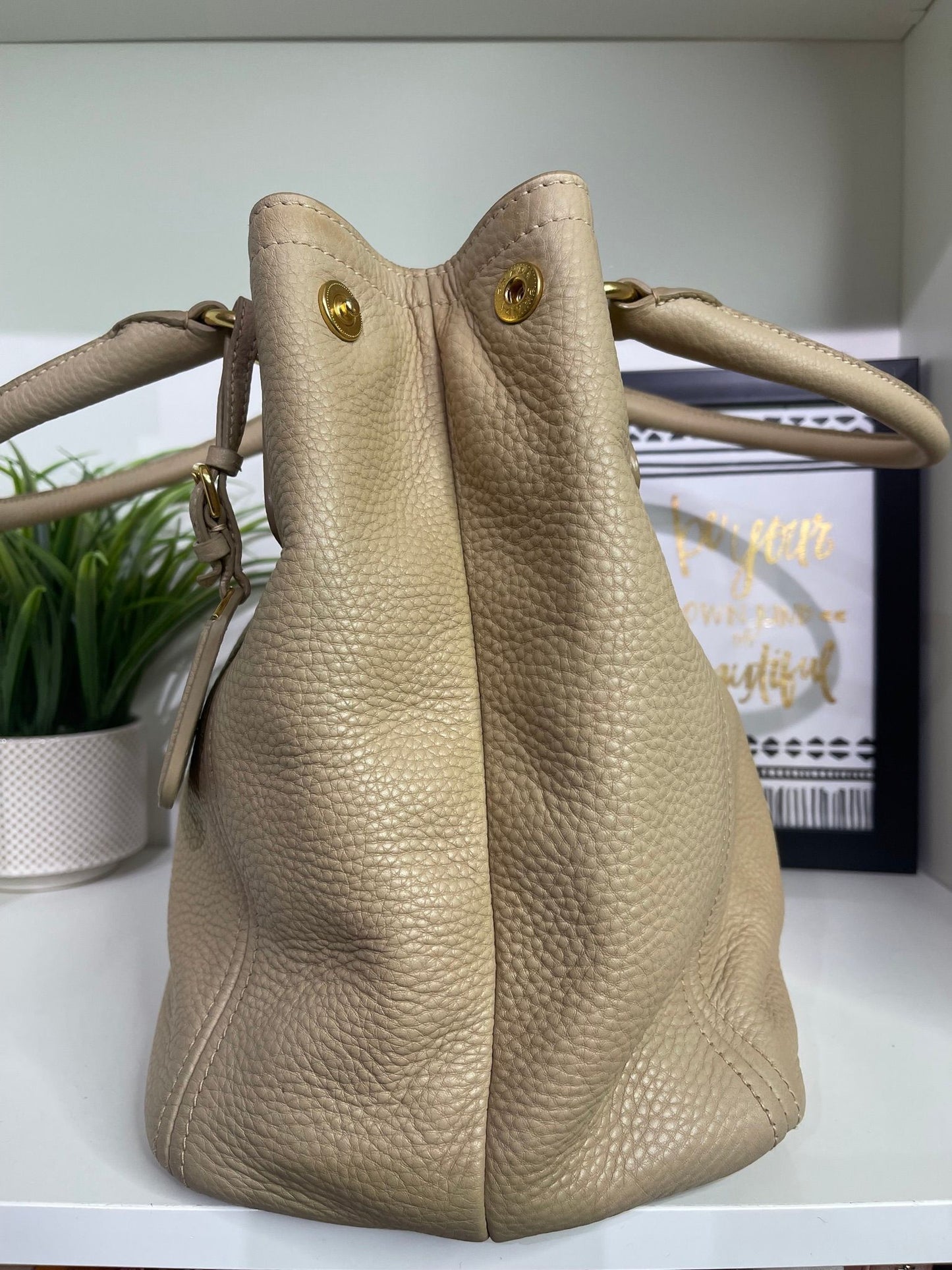 44. Prada Beige Hobo Bag