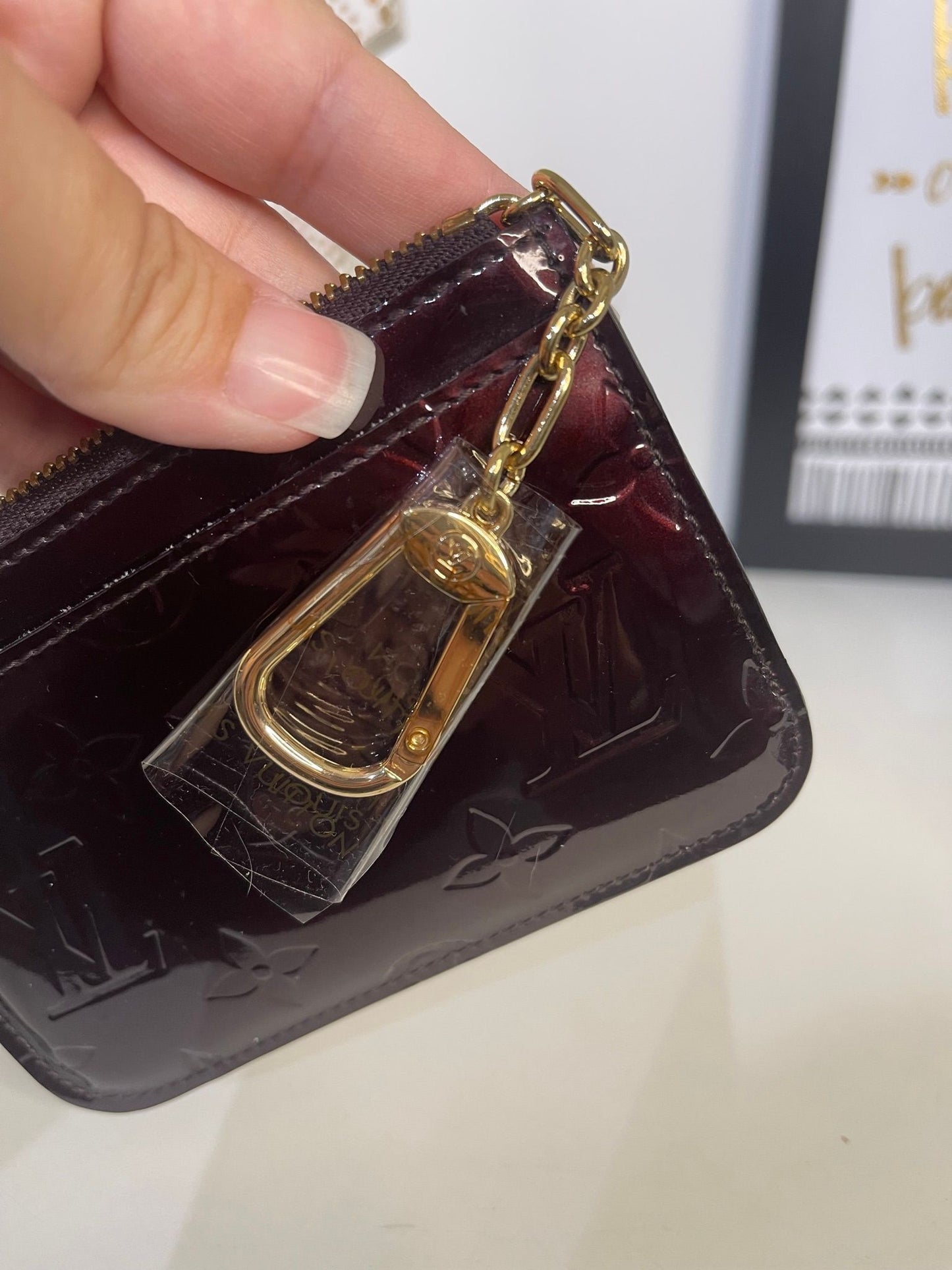 42. Louis Vuitton Amarante Vernis Key Cles