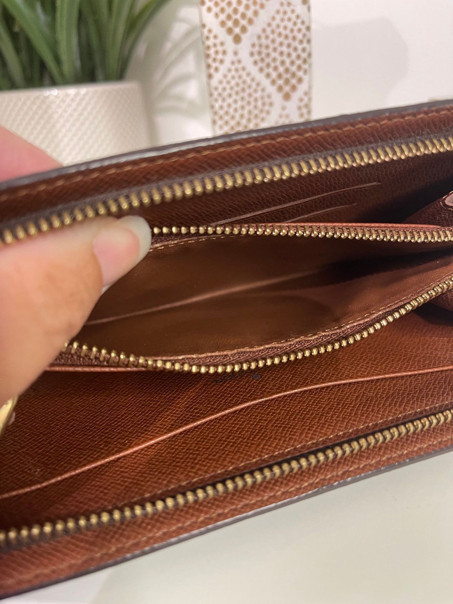 120. Louis Vuitton Monogram Porte Monnaie Zip Wallet