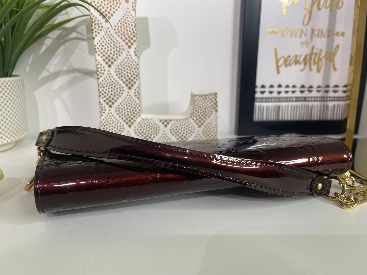 31. Louis Vuitton Amarante Vernis Sunset Boulevard Pouchette