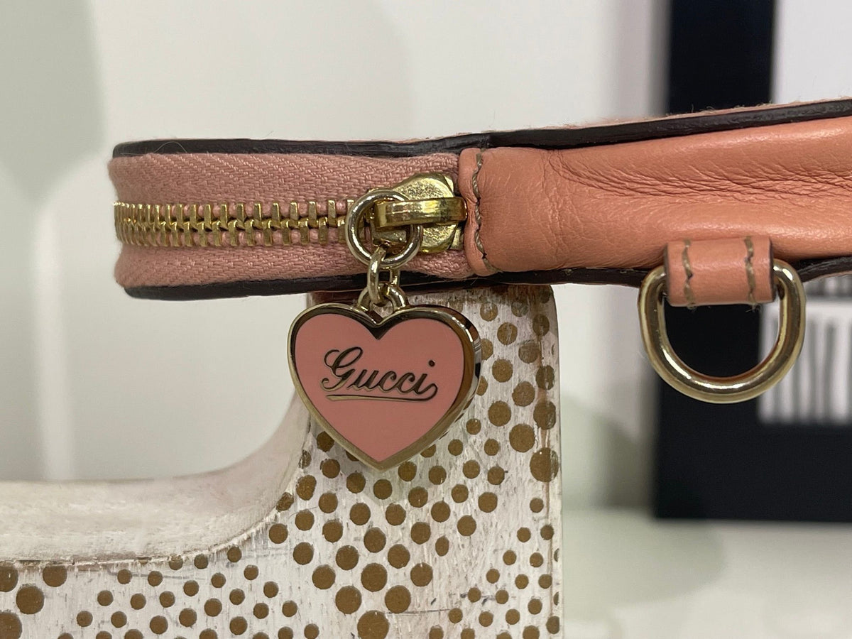 94. Gucci Pink GG Heart Coin Pouch