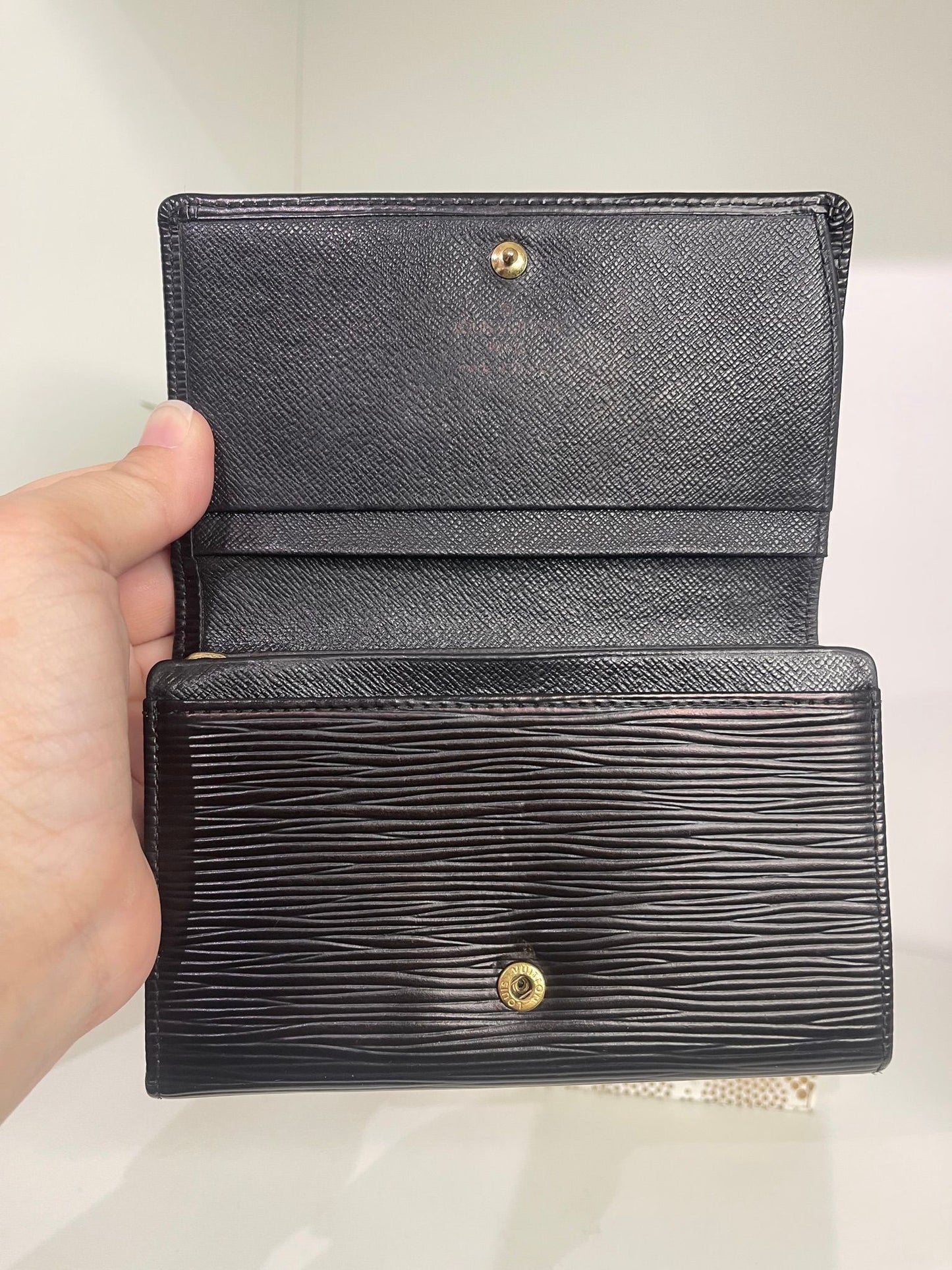54. Louis Vuitton Black Epi Tressor Wallet