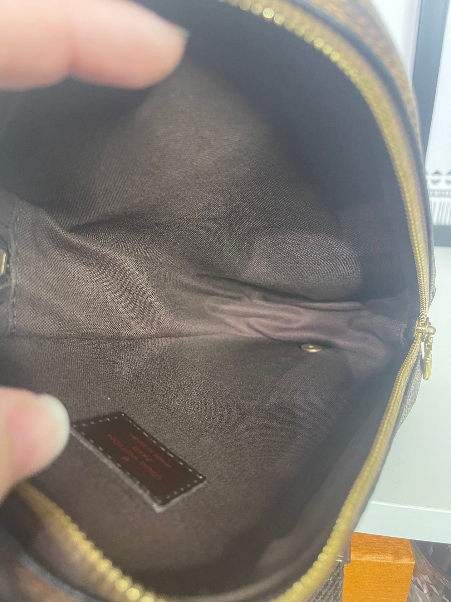 69. Louis Vuitton Damier Ebene Gange Sling Bag